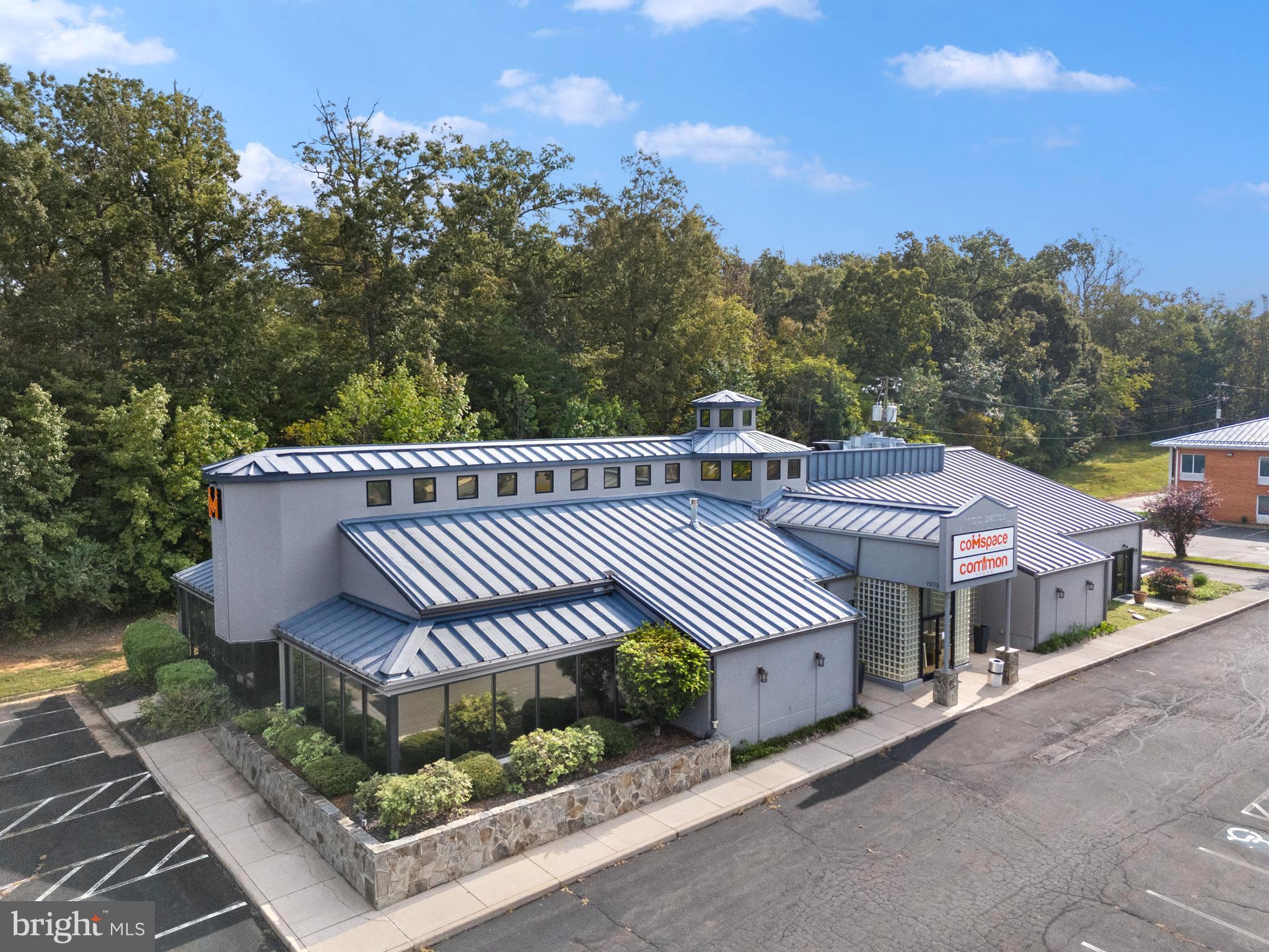 Incredibly well-designed and versatile 8,000+ sq ft commercial building located just minutes outside the heart of Warrenton, VA. Previously used as a restaurant and event space, this property offers endless potential for a variety of business ventures — from catering and food service to professional offices, creative studios, or retail. Inside, you'll find multiple office suites, a fully equipped commercial kitchen, and modern finishes throughout. The current  layout includes eighteen offices, two conference rooms, coffee bar with several entrances, including a main double-door entry, providing flexibility for multiple tenants or business functions. Whether you're expanding your business, launching a new venture, or looking for the perfect space to bring your vision to life, this building is a rare opportunity in a prime location. Let your dreams become reality — design and customize the space to suit your needs! Buyer to confirm potential new uses with the county.