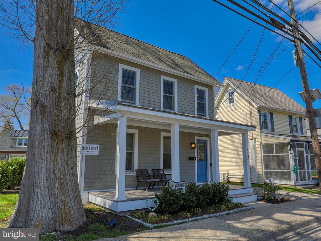 Located in the heart of Historic Downtown Lewes, Delaware, just 2.5 blocks to Second Street, this beautifully restored two-unit coastal property offers a rare opportunity for investment, multi-generational living, or a flexible beach retreat. Completely gut-renovated in 2024, both residences were thoughtfully redesigned and rebuilt from the studs with exceptional attention to detail, blending historic charm with modern coastal living.

Adding to the property's unique character and history, don't miss the historic Bride and Groom tree planted in 1812, a rare and meaningful feature that reflects Lewes' rich heritage and timeless appeal.

The property features two separate units, including a 2-bedroom, 1-bath residence and a 2-bedroom, 2-bath residence, sharing a private driveway and fenced backyard — ideal for outdoor entertaining, guests, or rental flexibility. Whether used as a primary residence with guest quarters, vacation home, or income-producing property, the possibilities are exceptional.

This extensive renovation included full interior and exterior rebuilds, all new windows and doors, new electrical service and panels, new plumbing supply and drain lines, new insulation with upgraded soundproofing between floors, new sheetrock, trim, cabinetry, flooring, tile, appliances, and lighting throughout. Structural improvements included foundation work, repaired framing, leveled floors, and new layouts, along with a vaulted ceiling in the second-floor bedroom.

Exterior improvements elevate both curb appeal and durability, including cedar shake siding on the front, LP SmartSide siding on the sides and rear, a new metal roof, gutters, downspouts, cedar fencing, hardscaping, and landscaping. Outdoor living spaces include a new side deck with cedar decking and PVC railings, along with a welcoming front porch featuring cedar decking.

Additional upgrades include new HVAC ductwork, full system cleaning post-construction, new sump pump with battery backup, Roof Maxx treatment on the existing shingle roof, and all necessary building permits and HPARC approvals completed during renovation.

Just 2.5 blocks to Second Street, enjoy easy access to Lewes’ charming shops, restaurants, coffee spots, canalfront dining, and local events, along with nearby Lewes Beach, Cape Henlopen State Park, and the Junction & Breakwater Trail.

This is a rare, turn-key multi-unit opportunity in Historic Lewes — completely renovated, thoughtfully designed, and ideally located in one of Delaware’s most desirable coastal towns, with a piece of Lewes history right in your backyard.