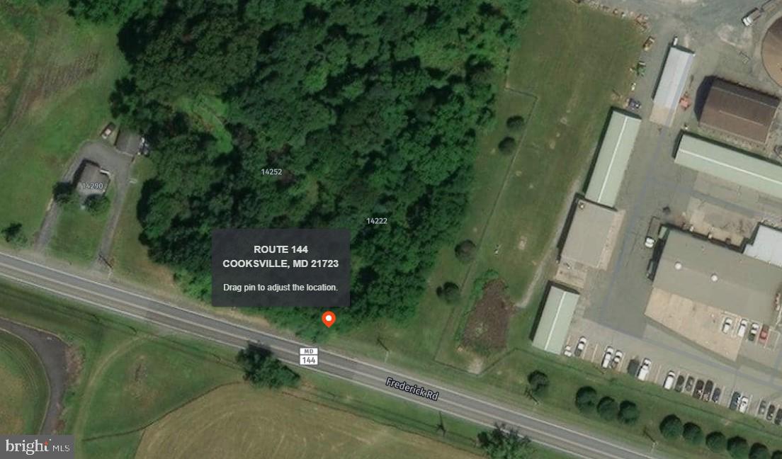 Available vacant lot in exceptional location.  1.06 wooded acres