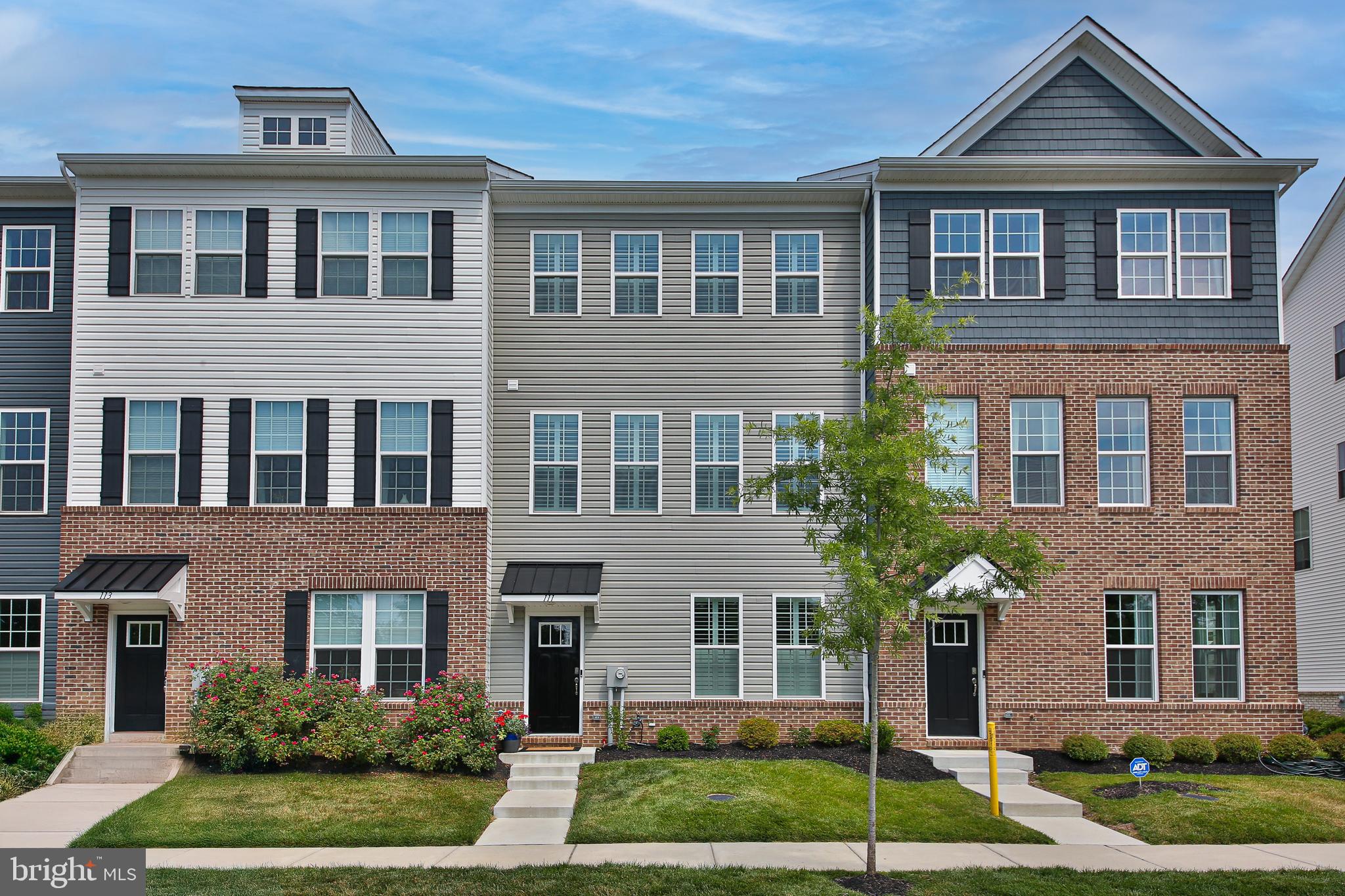 Welcome to 111 Smithworks Blvd. in Phoenixville. This property sits in an ideal, walk-to-town location within the Steelpointe community, and features over $100K in custom upgrades. The current owner worked with a local interior designer to curate a luxurious home…only to get transferred for work. This creates unparalleled opportunity for Phoenixville buyers! The main living level is open, airy and bright, with a flowing floorplan ideal for everyday living. The kitchen features stainless appliances, including a double oven, a custom-painted island with pendant lighting and a pantry with a California Closets system to optimize organization. The dining area has ample space for a large table, and sliders to the deck. The living room has a built-in electric fireplace with shiplap surround, and plantation shutters, which are also on most windows throughout the home. The owners created a functional computer nook from a closet in this room. The beautifully wallpapered powder room completes this level. Upstairs, the primary bedroom is spacious with an impressive walk-in closet. The ensuite bath has a dual-sink vanity, tiled shower, and separate water closet. Upper-floor laundry is convenient and its ample shelving will keep you tidy and organized. The hall bath has neutral décor and timeless finishes with a tub/shower combo, vanity with storage and upgraded linen closet. The two additional bedrooms each have their own closet organization system. The lower level provides an ideal office, exercise or play area, and the current owner had custom pocket doors added for privacy. The two car garage is the envy of the neighborhood. The new owner can simply choose their custom cabinet design and clip into the existing wall mounts. Last year, Travel + Leisure named Phoenixville the #1 Best Small Town in the country. At 111 Smithworks, you’ll have all that Phoenixville has to offer at your fingertips. Grab your morning coffee at Steel City, enjoy lunch al fresco at Bistro, wander through the Foundry, or bring your friends to one of the First Friday events. Simply unpack your bags, walk into town and enjoy! Schedule your showing today.
