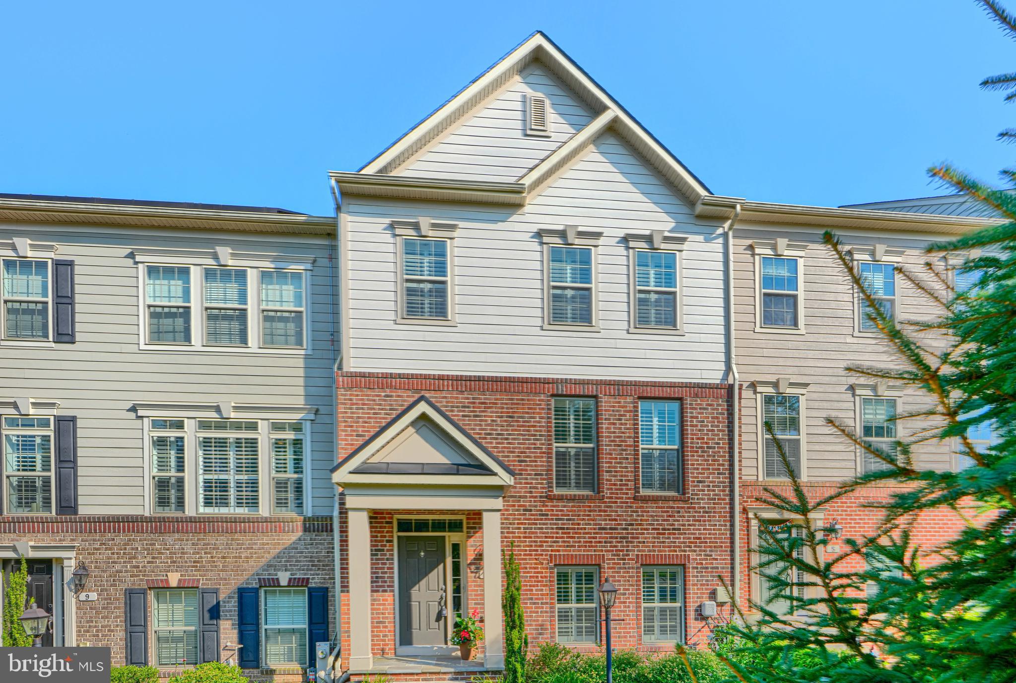 Beautifully maintained 3 BR 3 ½ bath  townhome in the sought-after Hunt Valley Overlook community, where low-maintenance living meets timeless style and easy convenience. Built in 2018 and lovingly cared for, this home offers numerous thoughtful upgrades that set it apart.
Featuring 3 finished levels above grade, this home offers a traditional floor plan with 9’ ceilings and an open, airy design that's ideal for both everyday living and entertaining.  Custom plantation shutters throughout the home add elegance and privacy.  The main level has a  beautifully appointed kitchen that features granite countertops, stainless steel appliances, abundant cabinetry and  a separate pantry.  It opens seamlessly to the inviting family room. This comfortable setting is anchored by a stunning stacked stone corner gas fireplace, installed in December, 2023, which creates a warm and cozy atmosphere during cooler months.  Just off the kitchen, step onto the private balcony where a retractable awning, installed in 2024, creates the perfect shaded retreat for outdoor relaxing. The spacious living and dining rooms offer more space to relax or entertain.  Wainscoting has been added to the power room, adding a refined touch.
The entry level offers exceptional flexibility and is currently used as a home office, complete with a full bath and direct access to the oversized two-car garage. Upstairs, all 3 bedrooms feature vaulted ceilings as well as ceiling fans for year-round comfort. The spacious primary suite is a true retreat, offering an en-suite bath with a double vanity and the luxury of two separate walk-in closets, providing exceptional storage and organization.
The HOA handles lawn care and snow removal, allowing you to spend more time enjoying everything this wonderful location has to offer.  Also zoned for some of the most  highly desirable elementary, middle and high schools in the county!   With many near-by conveniences, it is just minutes from Hunt Valley Towne Centre, Wegmans, restaurants, shopping, the NCR Trail, and I-83.
