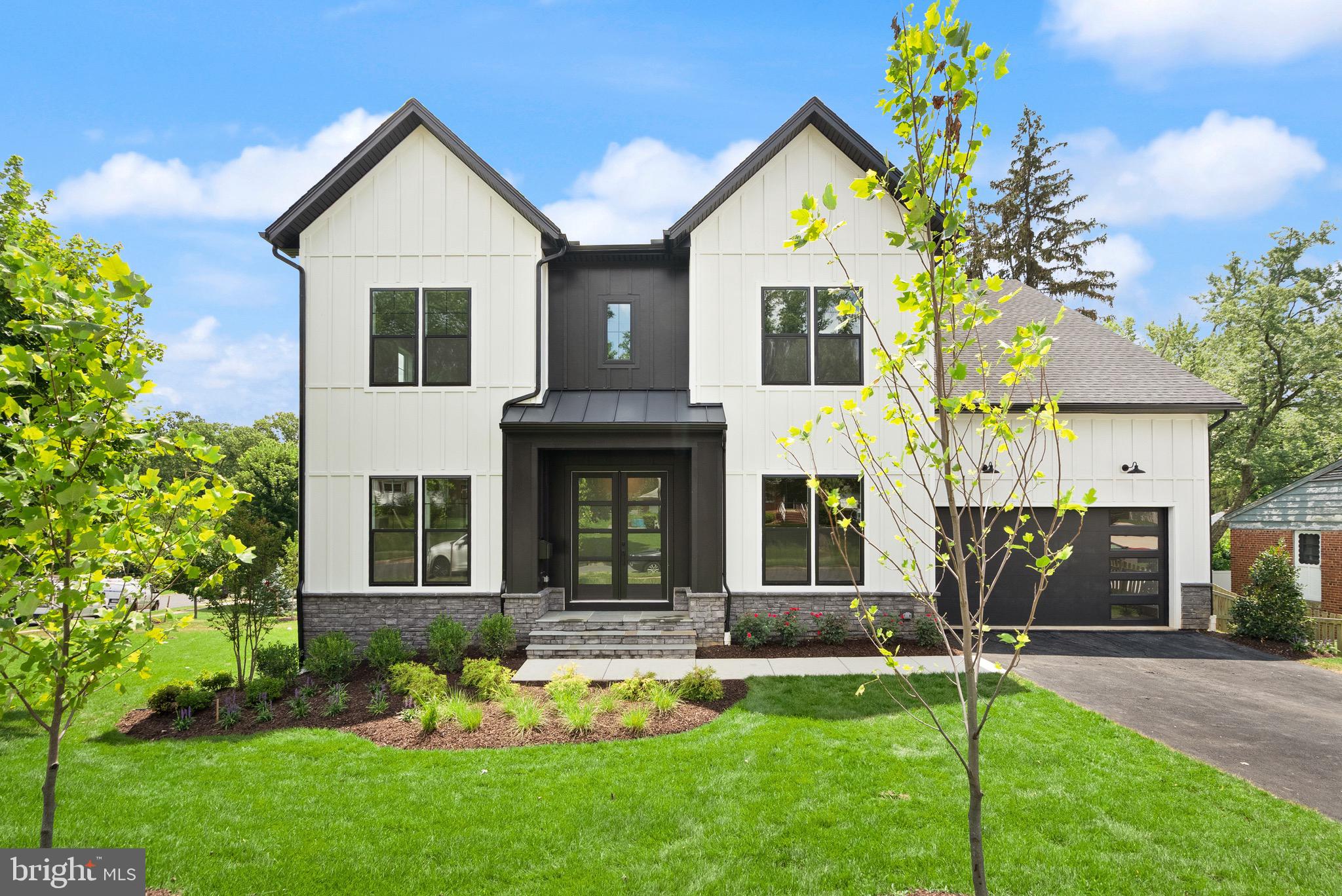 *Visit our off-site open house this Sunday from 12–3 PM at 11800 Valley Road Fairfax, VA 

*  TO BE BUILT HOME – COMPLETION FORECAST: Fall 2027.  Enjoy estate style living on one of 3 large homesites in this new construction enclave in the highly sought-after Oakton HS District!   With a modern farmhouse exterior, this luxury home offers both privacy and convenience, just minutes from Rt 66, with abundant shopping and dining nearby in Fairfax. Evergreene Homes proudly presents The Chapman, one of our most popular floor plans. The list price includes our exclusive Diamond Features Package, with options to further personalize the home by selecting from the following Structural Options: 3-Car Garage, Morning Room Extension, Main-Level Guest Suite with full Bathroom, Butler’s Pantry, Laundry Room Cabinets with Sink, an additional 5th Bedroom and full Bathroom above the Garage, and optional Basement areas such as a Recreation Room, Bedroom, Full Bathroom, Media Room, and Exercise Room. Upon entering the foyer, you’re welcomed by gleaming hardwood floors and dual staircases featuring modern metal horizontal balusters with a wood handrail, along with a spacious Living Room and formal Dining Room. The Designer Kitchen is truly impressive, with maple cabinetry extending to the 10’ ceiling, glass-faced upper cabinets, GE Café appliances, soft-close drawers, and quartz countertops for a sleek, elegant look. An oversized island provides ample seating and additional storage. Designed for comfortable living, the Great Room includes a modern linear gas fireplace, dedicated entertainment wall, and an impressive coffered ceiling. The Mud Room offers generous storage for shoes, backpacks, and sports gear. For those working from home, the main-level Den at the back of the home is ideal, with the option to convert the Living Room into a second home office if desired. Upstairs, the highlight is the expansive Owner’s Suite with a Sitting Room and oversized Walk-In Closets, accessible from both the bedroom and bathroom—a standout design feature. The Owner’s Bedroom also includes double box ceilings, while the Owner’s Bath offers a large frameless shower, soaking tub, and dual vanities. Each of the three additional upper-level bedrooms is generously sized, with one en-suite bath and one shared Buddy Bath. Our homes are crafted with top-quality features, including a whole-house fan on the second level to improve air quality, a humidifier, electronic air cleaner, abundant recessed lighting, a 10-year transferable Builder’s Warranty, upgraded 2x6 framing, advanced thermal insulation, and pest control tubes within exterior walls.