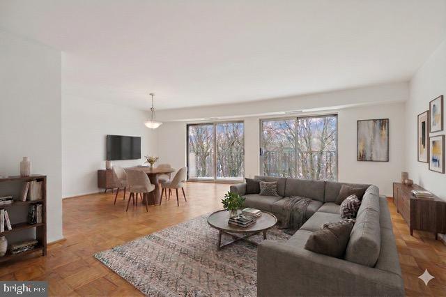 Perhaps the best buy in town -  A rare opportunity to own a condo in Montgomery County for under $200K.  Located in Parkside Plaza, this spacious and light-filled 1-bedroom, 1-bathroom residence features fresh paint and exceptional views throughout.  The home offers a large kitchen and an open dining and living area that leads to a private balcony overlooking a peaceful, tree-lined setting. The bedroom serves as a true retreat with floor-to-ceiling windows and a walk-in closet, while well-maintained parquet flooring adds warmth to the entire space.  Additional conveniences include off-street parking and a separate storage unit that conveys with the property.  Residents of Parkside Plaza enjoy premium amenities, including: - 24-hour concierge - Fitness center and sauna - Outdoor pool.   As an added value, all utilities (except cable and internet) are included in the condo fee, ensuring predictable monthly expenses.