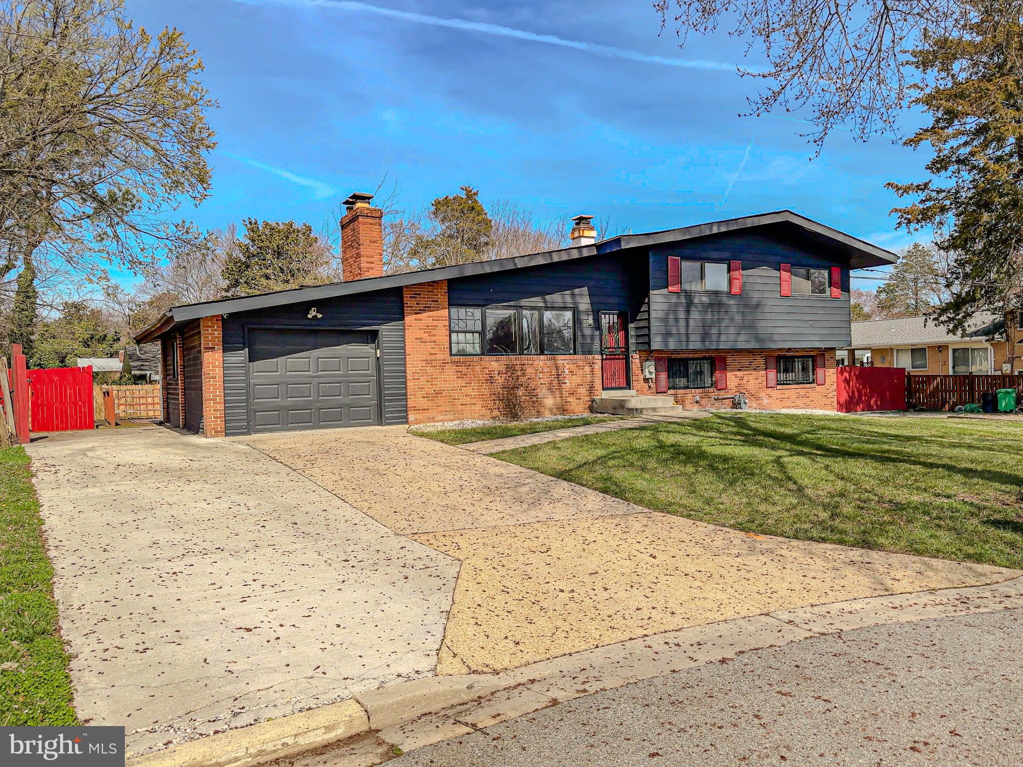 HUGE PRICE REDUCTION!! Don't miss this incredible opportunity to own this beautiful home at a great value. Schedule your showing today!

Welcome to 5504 Westminster Court, a spacious split-level home tucked away on a cul-de-sac in Temple Hills. This 4-bedroom, 3 full bath residence offers a functional layout with multiple living areas, hardwood flooring, and updated features throughout.

The main level features a light-filled living room, separate dining area, and a kitchen equipped with granite countertops, stainless steel appliances, and ample cabinetry. Just off the kitchen and dining area, an additional living space provides the option for a theater room, recreation area, or flex space, offering a natural extension for entertaining or everyday use.

The upper level includes well-sized bedrooms and updated bathrooms.

The lower level highlights additional living space with a large family room, fireplace, and a second full kitchen, providing flexibility for extended living arrangements, guest space, or potential separate living quarters. With its layout and features, the lower level offers added versatility for a variety of uses.

Additional features include new carpet, fresh paint, two fireplaces, a 1-car attached garage, and a side entrance. The exterior offers a deck and a fully fenced backyard.

Conveniently located with access to major commuter routes including I-495/I-95, Suitland Parkway, nearby Metro stations, shopping, dining, and local amenities.