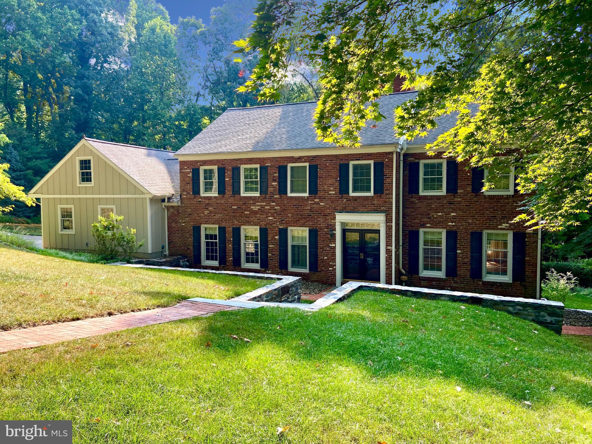 Welcome to 39 Highview, a beautifully updated, move-in ready home in the sought after Northwoods neighborhood of Radnor Township. This gorgeous 2-story brick Colonial home with fabulous curb appeal, features a gorgeously updated kitchen, beautiful bathrooms, spacious and sunny rooms, and a first floor designed for easy living and entertaining.  
Step inside and be greeted by an interior adorned with custom millwork, built-ins, and hardwood flooring throughout most of the home. As you enter, to the right of the Foyer, is the front to back Living Room with gas fireplace, full height windows and a large bay window overlooking the rear yard bathing the room in natural light. The Formal Dining Room, to the left of the Foyer, provides the perfect space for elegant dining. The gourmet Kitchen is a chef's dream with gorgeous full height white cabinetry, quartz countertop, subway tile backsplash, double wall ovens, Sub-Zero refrigerator, gold toned fixtures, an oversized center island with seating, and a gas fireplace for added ambiance.  Adjacent to the Kitchen is the sunny Breakfast/Morning Room perfect for casual family meals at home with accent lighting adding a touch of sophistication to the room. Double sliding doors from the Kitchen and Breakfast/Morning Room lead out to the rear Patio/Deck providing easy flow for your indoor/outdoor entertaining needs. Enjoy the comfort of radiant flooring in the Mudroom conveniently located just off the Kitchen featuring built in storage and offering access to the attached 2 car expanded Garage and rear Patio/Deck.
Heading upstairs, discover a beautifully appointed Primary Bedroom Suite with custom millwork & built-ins, double closets and private updated ensuite Bath with seamless shower enclosure. There are 3 additional sizable Bedrooms, each with custom closets, on this level that share a stylish renovated Full Hall Bathroom with tub/shower combination.
One more level up and you’ll find a finished Walk-up Attic, complete with baseboard heating and a large walk-in closet. There are endless possibilities for this space to be used as a possible 5th Bedroom, office, playroom, or a workout room.
The finished lower level has a cozy gas fireplace, large windows, and a door to the rear yard. This additional room is perfect for a game room, office, or your own personal retreat. You will also find the laundry on this level.
Park with ease in the Expanded 2-Car Garage, featuring upper-level storage for added convenience.
The home sits on a 1+ acre lot, a true natural oasis, offering the perfect blend of privacy and outdoor enjoyment. Imagine hosting gatherings or enjoying a peaceful moment surrounded by the mature trees and picturesque views.
This is a great opportunity to live in this coveted neighborhood in the award-winning Radnor School District, minutes to downtown Wayne, King of Prussia, great restaurants, shopping, major highways, Center City, and the Philadelphia International Airport.