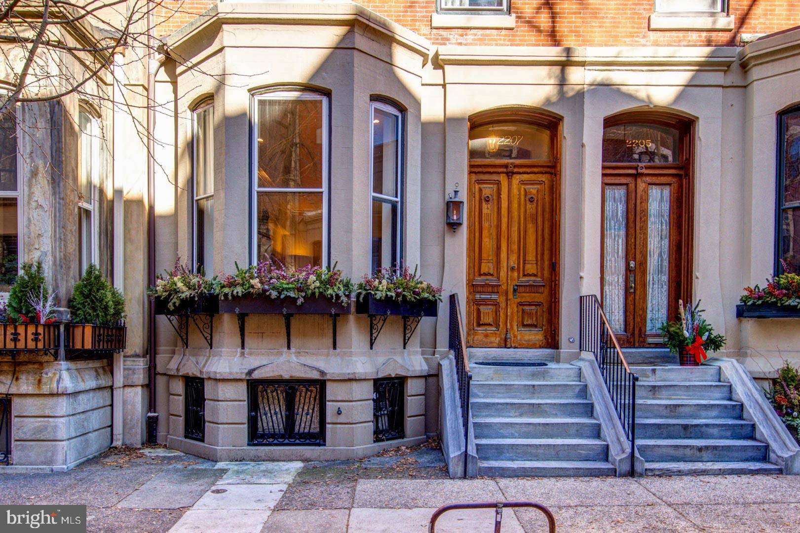 20’ wide Quintessential Philadelphia Townhouse on a tree-lined, picturesque block.  5 bedrooms, 4.75 baths on 5 levels. This 1850 home built before domestic electricity is filled with light even on a rainy day.  Enter through the vestibule with original tiled floor into a double length living room with soaring 12’ ceilings, fluted columns, bay window, wood mantle with green tile insert. Large eat in kitchen with juliet balcony, gas fireplace with distinctive tilework and iron firebox. There is a quarter bath cleverly tucked under the stairs on this level.  Upstairs on the second floor is a large library with built-in shelving in the rear and the south facing primary suite in the front of the house. The third floor has two more bedrooms. The rear bedroom has a hall bath and the front bedroom has an en suite bathroom. The fourth floor has two more bedrooms and a jack and jill bath. The english basement is partially finished with a large den and bar, half bath, access to the rear yard and a large storage area in the unfinished section. This home has been very well maintained though some will want to update the kitchen and baths.   In addition to all the shopping, theatre and restaurants of Rittenhouse Square the property is 1 block to Fitler Square, 3 blocks to the Schuylkill River Park and Trail. Easy access to 30th Street AMTRAK station, Routes 676, 76 , 95 and the Philadelphia International Airport.