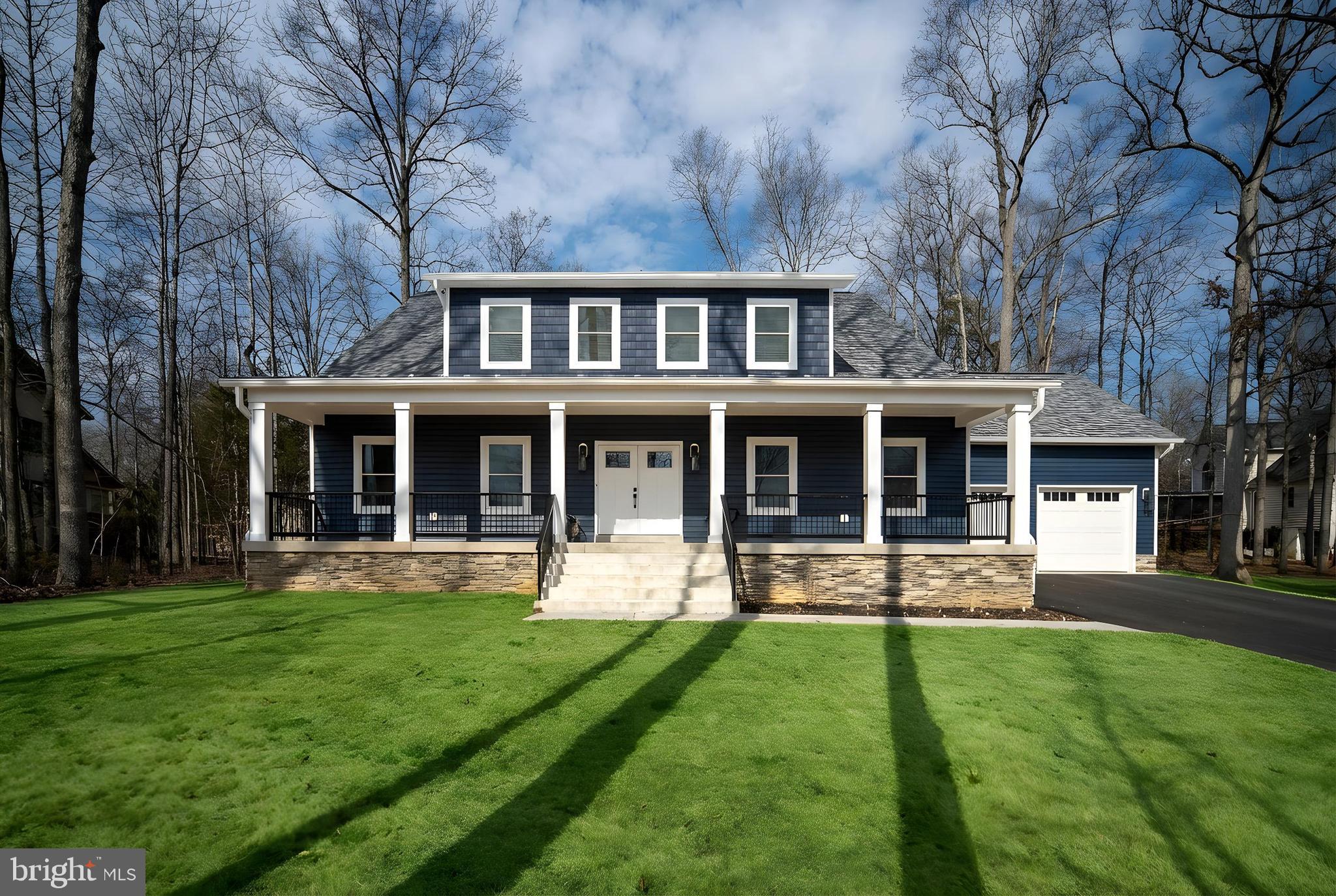 Welcome to 261 Washington St., where every detail has been thoughtfully designed to create a truly extraordinary living experience. As you pull into the driveway, it’s clear that this is no ordinary home. Picture yourself unwinding on the charming front porch, sipping your morning coffee while gazing at the serene lake views. Just a hop, skip and a jump, the nearest beach is perfect for casting a line, and the clubhouse beckons with stunning sunsets that will take your breath away.

This craftsman-style home radiates personality and warmth. Step inside to find engineered hardwood floors that flow seamlessly throughout, leading you to a gourmet kitchen that will inspire any chef. With stunning quartz countertops, a magnificent herringbone tile backsplash, and a spacious island, this kitchen is a perfect blend of functionality and elegance—ideal for entertaining or quiet family dinners.

Nestled on a premium water view lot, the home boasts breathtaking vistas that will captivate you morning and night. The primary suite is your sanctuary, featuring a luxurious en suite bath complete with a separate soaking tub, providing a perfect escape from the day's stresses. The main level also includes an additional bedroom and bath, ensuring all your living needs can be comfortably accommodated on one floor.

Venture upstairs to discover two more inviting bedrooms, a stylish bathroom, and a generous bonus room, perfect for recreation or relaxation—all with stunning lake views.

This home is brimming with custom features, including  a Generac generator, a tankless hot water heater, alongside a lawn irrigation system to keep your outdoor space lush and vibrant.

Don’t miss your chance to make this exceptional home yours, situated in the amenity-rich community of Lake of the Woods, where lifestyle meets leisure. Residents enjoy access to a 550-acre main lake, a clubhouse for dining, a swimming pool, a fitness center with lake views, an 18-hole golf course, and a vibrant community center filled with various outdoor activities, clubs, and organizations. Make the move today!