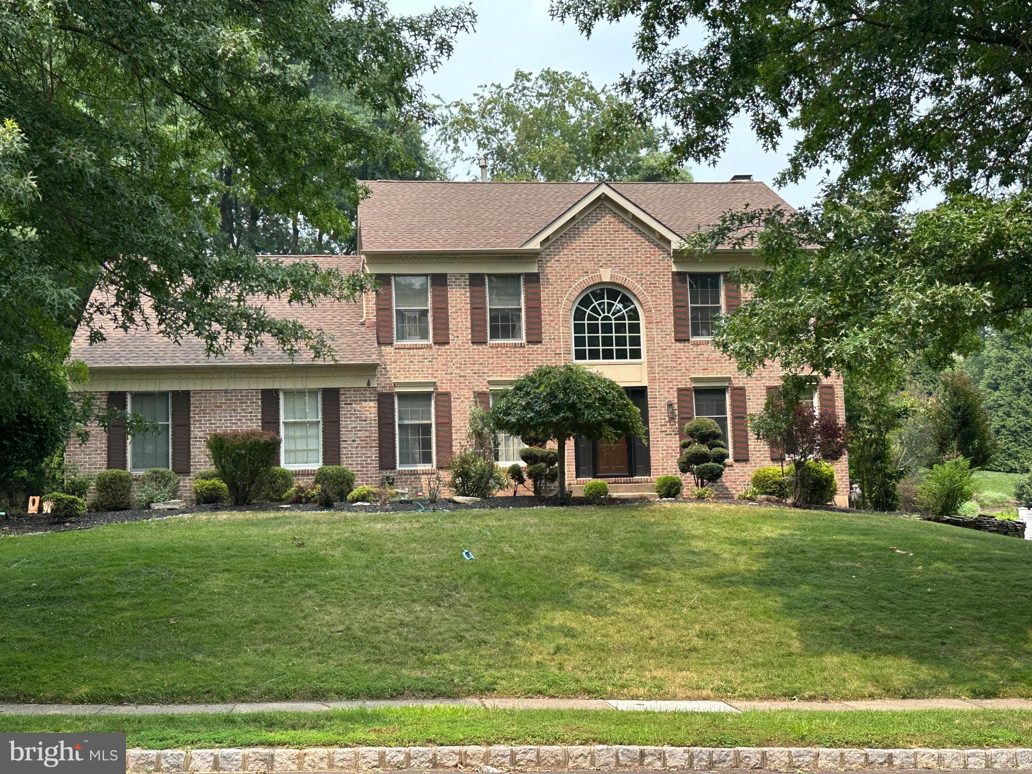 Professional Pictures To Come - This brick-front Center Hall Colonial offers it all! Enjoy your private yard, custom designed deck, wonderful hardscape, + 2-car garage  2-story Foyer, hardwood floor entry w/  sparkling Palladium window opens to a large dining room + living room boasting crown molding + chair rail wood work. Family room offers gas fireplace, neutral paint and adjoins eat in kitchen. Bright and sunny, the kitchen boasts stainless steel appliances, large island + glass doors leading to spacious deck w/built in benches. Main level laundry room w/utility tub has outside entrance. Turned stairs with upgrade banister and wood floors throughout the second level. Lovely large master suite w/ double door entry, ceiling fan, walk -in closet +full bath w/ vaulted ceiling, sky light, and whirlpool tub. 3 additional nice-sized bedrooms + hall bath w/ double sink complete the upper level. Full finished basement, electric fence complete the package! 3 minutes to Rt. 1 and 95. All in the award winning Pennsbury School District!

Welcome to 124 Mountain Oaks Drive, a beautifully updated brick-front Center Hall Colonial nestled in one of Yardley’s most desirable neighborhoods. Offering timeless curb appeal, exceptional updates, and a private backyard designed for entertaining, this home is truly move-in ready.

Step through the impressive two-story foyer featuring hardwood flooring and a dramatic Palladian window that fills the home with natural light. Elegant formal living and dining rooms showcase crown molding, chair rail accents, and classic architectural details. The inviting family room, complete with a cozy gas fireplace, flows seamlessly into the beautifully remodeled eat-in kitchen.

The kitchen has been thoughtfully updated with professionally refinished cabinetry, stainless steel appliances, a spacious center island, and abundant workspace. Sliding glass doors lead to a custom-designed deck with built-in seating overlooking a private backyard featuring beautiful hardscaping—perfect for outdoor dining, entertaining, or simply relaxing.

Convenience continues with a first-floor laundry room complete with utility sink and exterior access. There is also a very private office on the first floor.  Upstairs, hardwood flooring extends throughout the second level, where you’ll find a spacious primary suite featuring double-door entry, a walk-in closet, ceiling fan, and an ensuite bath with vaulted ceiling, skylight, whirlpool tub, and separate shower. Three additional generously sized bedrooms and an updated hall bath with double vanity complete the second floor.

The finished basement offers outstanding additional living space ideal for a recreation room, media room, fitness area, playroom, or home office.

This home has been extensively improved over the years, including:
• 2017 – Complete HVAC replacement (natural gas forced-air heating and central air conditioning)
• 2019 – New basement flooring
• 2020 – Updated bathrooms
• 2022 – Complete roof replacement
• 2024 – Full exterior siding replacement 
• 2024 – Kitchen cabinetry professionally refinished
• 2025 – Extensive kitchen and first-floor remodeling

Additional highlights include a two-car garage, electric pet fence, neutral décor throughout, and an outstanding location just minutes from Route 1, I-95, shopping, dining, parks, and trains to Philadelphia and New York.

Located in the highly acclaimed Pennsbury School District, this beautifully maintained home combines classic Colonial charm with today’s most desirable updates. Don’t miss this exceptional opportunity to call 124 Mountain Oaks Drive home.
