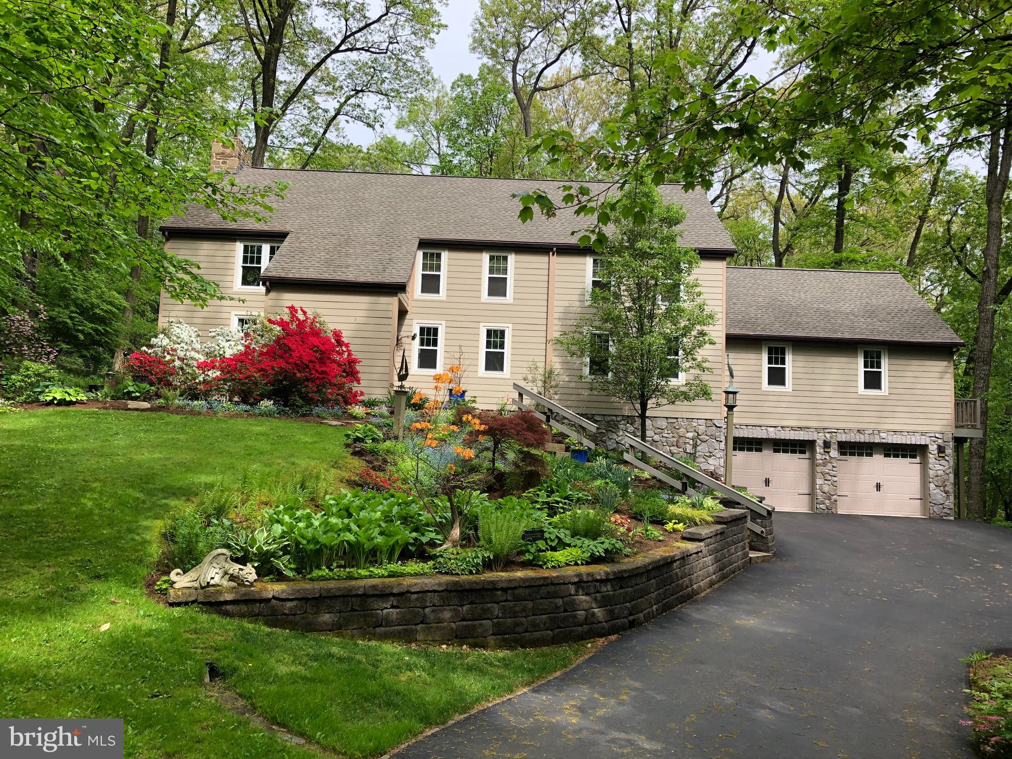 Prepare to be impressed! This move in ready home is sited on a private road with total privacy in the heart of East Hempfield. This original owner home is a modified Post and Beam "Yankee Barn" design with many custom designs and built-ins throughout. While 40 years old this home has been extremely well maintained and lovingly updated with many modern touches and is like new. New kitchen, 50-year roof, fiber cement siding, windows, HVAC and water heater all within the past 9 years or less. Massive 2 story stone fireplace provides warmth and charm as you enter the home. The charm continues with the wide white pine floors and wood details throughout every room. Over 3500 square feet of living space plus a walk-up attic and a finished basement featuring a 900-bottle wine cellar and a 2nd fireplace. Enjoy the fine craftmanship, attention to detail and charm as you view this home. Please review the virtual tour and the home narrative in the documents.