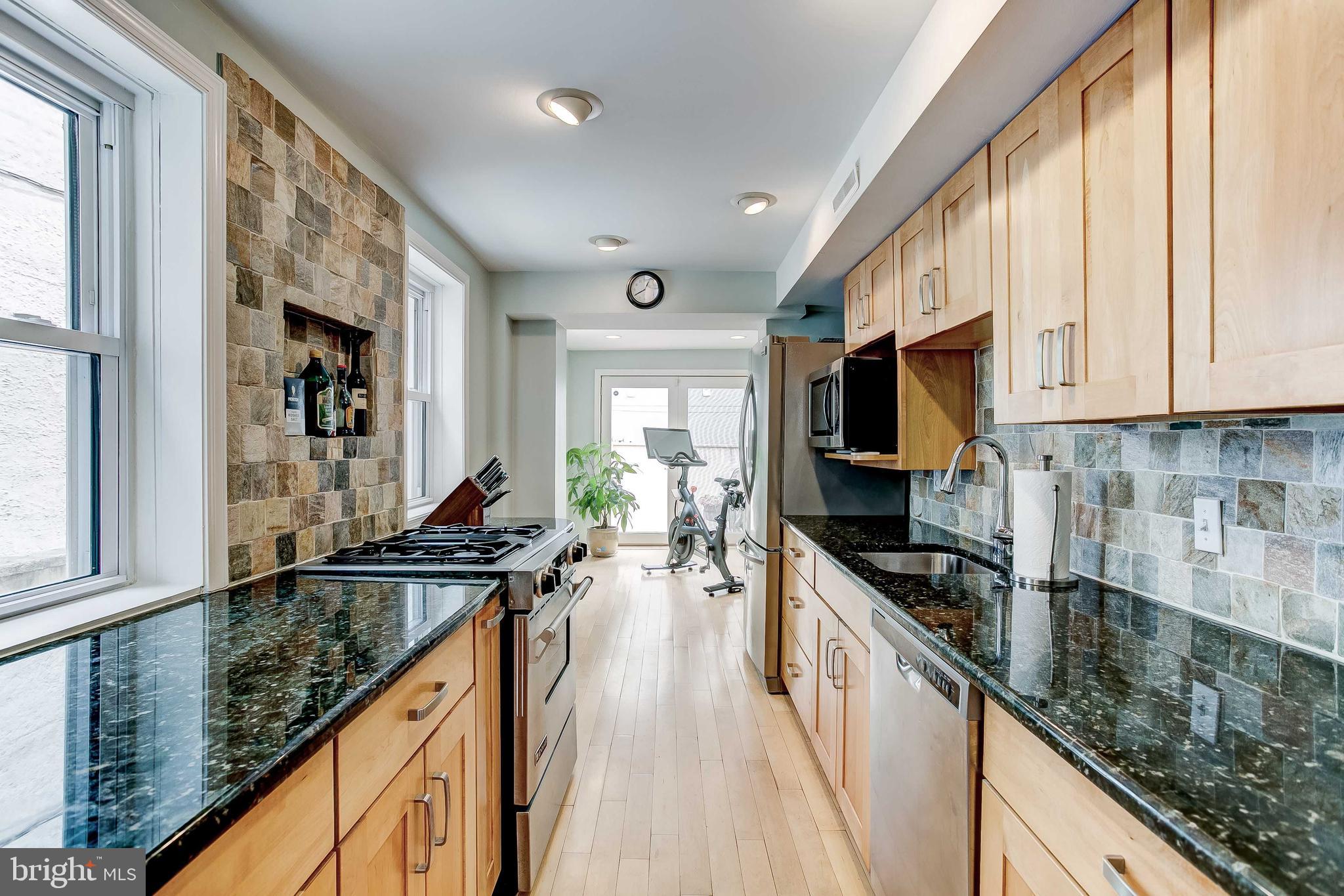 This charming 3-story townhouse in Little Italy, Baltimore’s premier neighborhood, offers a perfect blend of comfort, privacy, and community. With neighbors who feel like family and a vibrant, close-knit atmosphere, this home is ready for you to move in and start your next chapter.  
The first level offers spacious living room and dining area ideal for entertaining, galley kitchen with modern appliances (new stove), breakfast room leading out to a charming courtyard, perfect for outdoor relaxation.  
Recent upgrades include a new mini split for efficient cooling and heating.
Second Level offers a generous bedroom with ample closet space, spa-like bathroom featuring a separate shower and soaking tub, renovated in 2018, a bonus area suitable for an office, exercise room, or study space, and easy access to the roof deck for outdoor enjoyment.  
Third Level houses a private suite with bedroom, bathroom (2018), and sitting room  providing a quiet retreat perfect for relaxing or hosting guests.  The sitting room can easily be used as a 3rd bedroom
Lower Level provides a finished area  for laundry and storage . Unfinished space for additional storage and utilities.   The roof deck has a  lovely city view!
Experience the best of Baltimore city living in this beautiful Little Italy home, where every detail has been thoughtfully updated for comfort and convenience.  Walker's Paradise with shops, restaurants, pharmacy, grocery, and gyms with in steps.  Schedule your tour today!