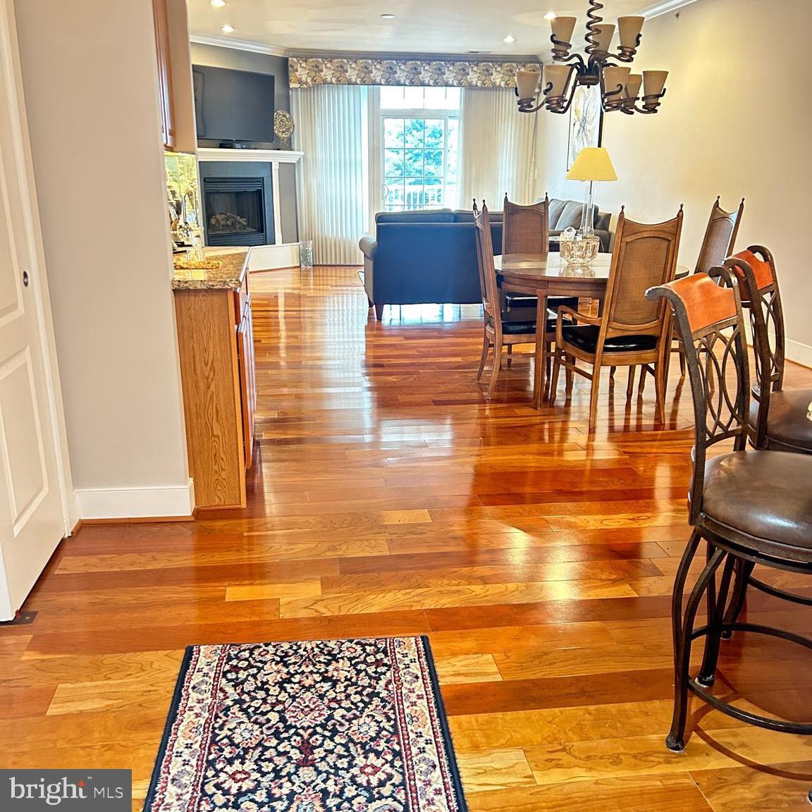 Take the elevator up to this  spacious  third floor condo. Immediately when you enter  you will love the open floor plan. This residence has two large bedrooms. The primary has an attached area which can be used for as an exercise area, reading /lounging area or an office space. Also a walk in closet and two additional closets. The living area showcases the thoughtful design while still having enough space to entertain, host a family dinner, or  just sit back and relax in front of the fire place or read a book out on the balcony. You no longer need to be overwhelmed by unnecessary square footage.  This unit has an oversized garage that you can enter into the building from, along with a storage unit.  Enjoy the on-site amenities: An outdoor pool, fitness room and activity room. Location, location, location. This is one of Bucks County's most desirable spots. Literally a stones throw from  some of the best shops and dining.  Easy access to major highways and close to multiple hospital systems.  Meridian Square is a community filled with friendly vibrant people.