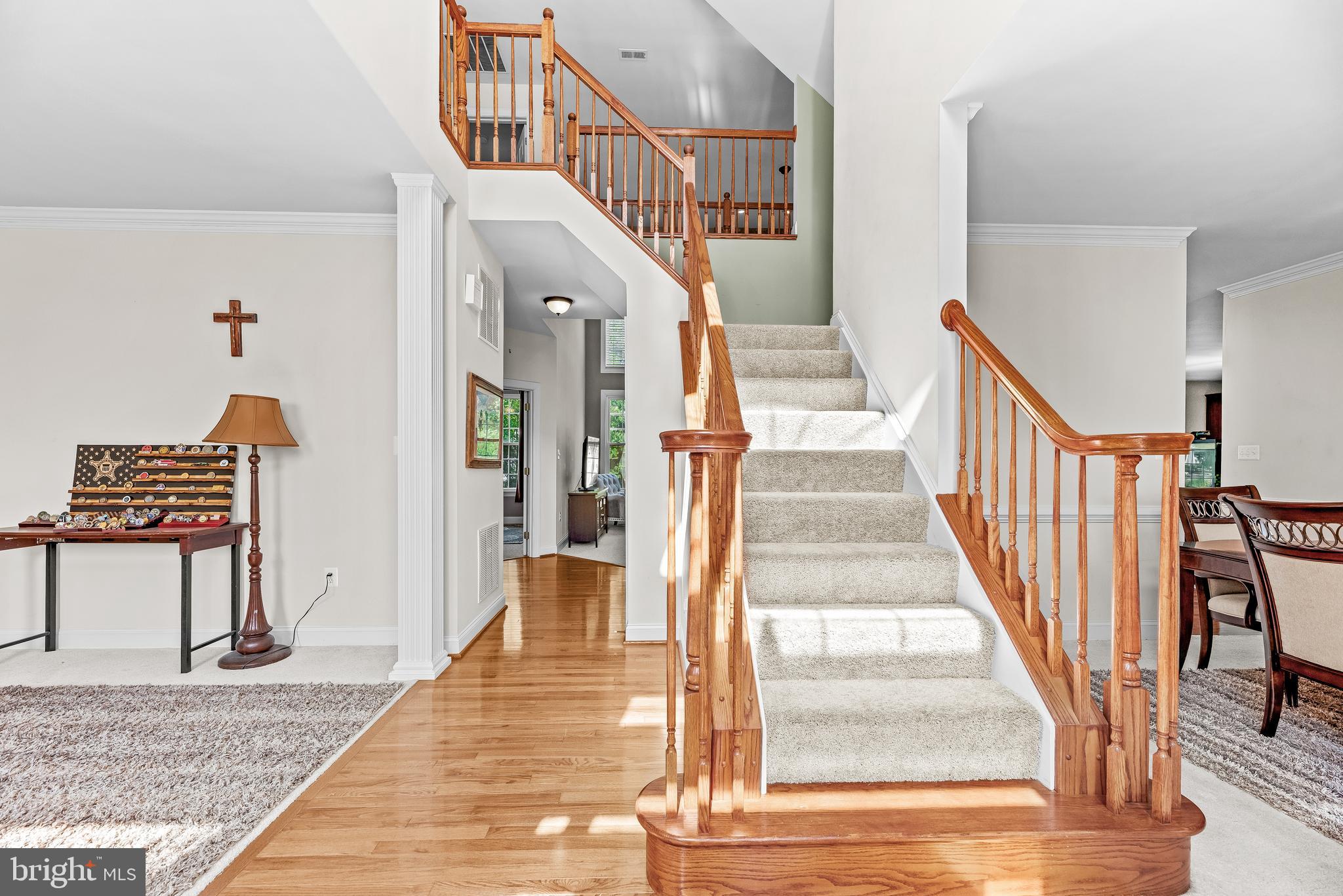 Welcome home to this absolutely stunning and elegant Colonial nestled in the highly sought-after South Queensberry neighborhood of Huntingtown, Maryland. This gorgeous residence offers over 4,200 square feet across the first three levels, plus an incredible fully finished lower-level basement, creating endless opportunities for entertaining, multi-generational living, or extended family accommodations.
From the moment you enter, you’ll appreciate the care, space, and upgrades throughout this beautifully maintained home. The heart of the property features an expansive kitchen complete with granite countertops, abundant cabinetry, and a spectacular bump-out dining area, creating the perfect gathering place for family dinners or entertaining guests. The main level also boasts new carpet, a spacious and bright formal dining room, and an additional bump-out bonus room—ideal for entertaining, a sitting area, home office, playroom, or even the perfect bar or lounge space.
Natural light pours through the home’s beautiful windows, creating a warm and inviting atmosphere throughout. Fresh, clean, and exceptionally well-maintained, this home offers elegance, comfort, and versatility at every turn.
Upstairs, you’ll find four spacious bedrooms on the upper level, providing comfort and flexibility for family and guests alike. The luxurious primary suite offers a grand double-door entrance and a spacious private bathroom designed for comfort and relaxation.
As you continue to the very top fourth level, you’ll discover an incredible finished bonus room, providing endless opportunities to fit your lifestyle. Whether used as a media room, guest retreat, playroom, home office, gym, additional entertaining space, or private getaway, this versatile area truly adds exceptional value and functionality to the home.
Prepare to be amazed by the fully finished lower level, which truly sets this property apart. Ideal for multi-generational families, dual living arrangements, or entertaining, this incredible space features a custom kitchen with beautiful cabinetry, granite countertops, and a stunning spa-inspired bathroom complete with a custom walk-in tile shower, double sinks, and a relaxing soaking tub. Filled with beautiful natural daylight and elegant lighting, the lower level also offers direct walk-out access to the private backyard, making it feel like an extension of the home rather than a basement.
Outside, enjoy a beautiful private tree-lined backyard, offering peace, privacy, and the perfect setting for relaxing summer evenings or entertaining guests. This home has been meticulously maintained and features a new roof, new heating and air conditioning systems, fresh updates, and new carpet throughout, making it truly move-in ready. 
Conveniently located with quick access to Joint Base Andrews, Washington D.C., Baltimore, and surrounding commuter routes, this exceptional home combines luxury, functionality, and location in one beautiful package .This remarkable home is an absolute must-see and will not last long. If you’ve been searching for the perfect home that offers space, elegance, flexibility for multi-generational living, and endless possibilities—this is it. Schedule your showing as soon as possible and make this beautiful Queensberry home yours just in time to enjoy summer living at its finest!