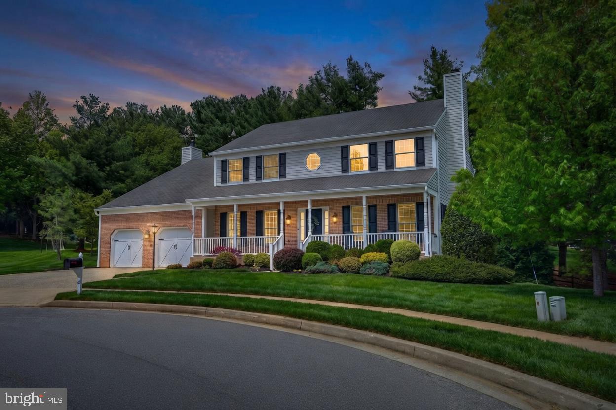 Ideally situated on the largest cul-de-sac lot in the highly coveted Mayfair community of Lutherville, this beautifully updated classic front-porch colonial offers 5 bedrooms, 4.5 baths, and nearly 4,000 square feet of finished living space in a prime location. With timeless elegance and thoughtful modern refinements, the home presents an outstanding layout that flows effortlessly for both everyday living and memorable entertaining.
Step into sun-filled interiors defined by beautiful hardwood flooring, built-ins, custom moldings, and stylish lighting. The entry foyer is stunning with a statement staircase, flanked by a bright living room with wood burning fireplace and an office or den with built-in shelving and desk, both of which flow into adjoining rooms for optimal convenience. The completely renovated gourmet kitchen is a standout, featuring premium GE appliances, including an induction stove and professional Wolf range hood,quartz counters, tile backsplash, three generous pantries, and a breakfast bar. Ample dining space is offered in the kitchen along with a separate dining room.  Adjacent spaces create an ideal entertaining flow: a family room anchored by a wood-burning fireplace with sliding doors that lead to a low maintenance, composite deck that extends living space outdoors as well as a fully renovated sunroom off the kitchen. 
The upper level is privately appointed with four bedrooms and three full baths. The primary suite offers a walk-in closet plus an additional closet, and a luxurious master bath recently renovated with dual vanities, a free-standing tub, glass shower enclosure, separate water closet, and ample storage. Three additional bedrooms, one with a walk-in closet, provide abundant space and closet storage. A dedicated upper-level laundry room with sink, storage, and Maytag Bravos XL washer and dryer adds everyday convenience.
The fully finished, walk-out lower level expands the living possibilities with a large recreation/living area featuring a kitchenette/wet bar with seating and full-size refrigerator, plus direct walkout access to the rear patio and yard. A fifth bedroom, a full bath, and a separate unfinished storage room complete this versatile level.
Outside, the expansive 0.42-acre lot creates a private retreat with mature landscaping and a large rear yard. The attached two-car garage, composite deck, and multiple outdoor living zones enhance the home’s appeal for year-round enjoyment in this quiet, convenient court setting.
This home reflects meticulous care and substantial investment, including a full kitchen renovation, bathroom renovations, fresh paint throughout, new carpeting, updated light fixtures, new light switches and outlets (2022); radon mitigation system (2022); new professional Wolf kitchen island range hood (2023); reverse osmosis system in kitchen (2022); entire sunroom roof replacement (2023); new hot water heater (2023); whole-house enlarged 6-inch gutters (2024); brand-new Carrier Infinity HVAC system (2025); and repaved front walkway (2025). Additional updates from the 2010 renovation (Hardiplank siding, Pella windows, and more) further underscore the property’s enduring quality.
A rare opportunity in Mayfair, across from the Baltimore Country Club and convenient to Towson, I-83, and the beltway, this home perfectly balances refined living with modern comfort in a premier location.