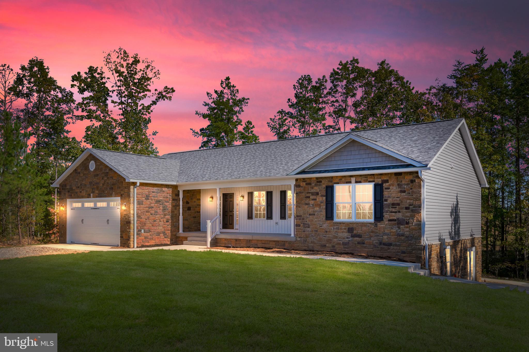 NEW CONSTRUCTION on over 3 private acres with pastoral and pond views.  Borders large farm parcel.  Fully loaded with upgrades and extensive stonework.  3 bedroom, 3 baths one level home. Offering  you an open kitchen with granite counters, farmhouse sink, island wine rack and stainless appliance package.  Living room with wood flooring and stone fireplace.  Spacious master suite with walk in closet, bath with ceramic tile, custom shower and soaking tub.  Walkout basement with exterior walkway, 9 foot ceilings, full bath, and a safe room. Deck off rear with gorgeous views. Two car garage and front porch.  4 bedroom septic. Not all photos are of this house. Some of other models