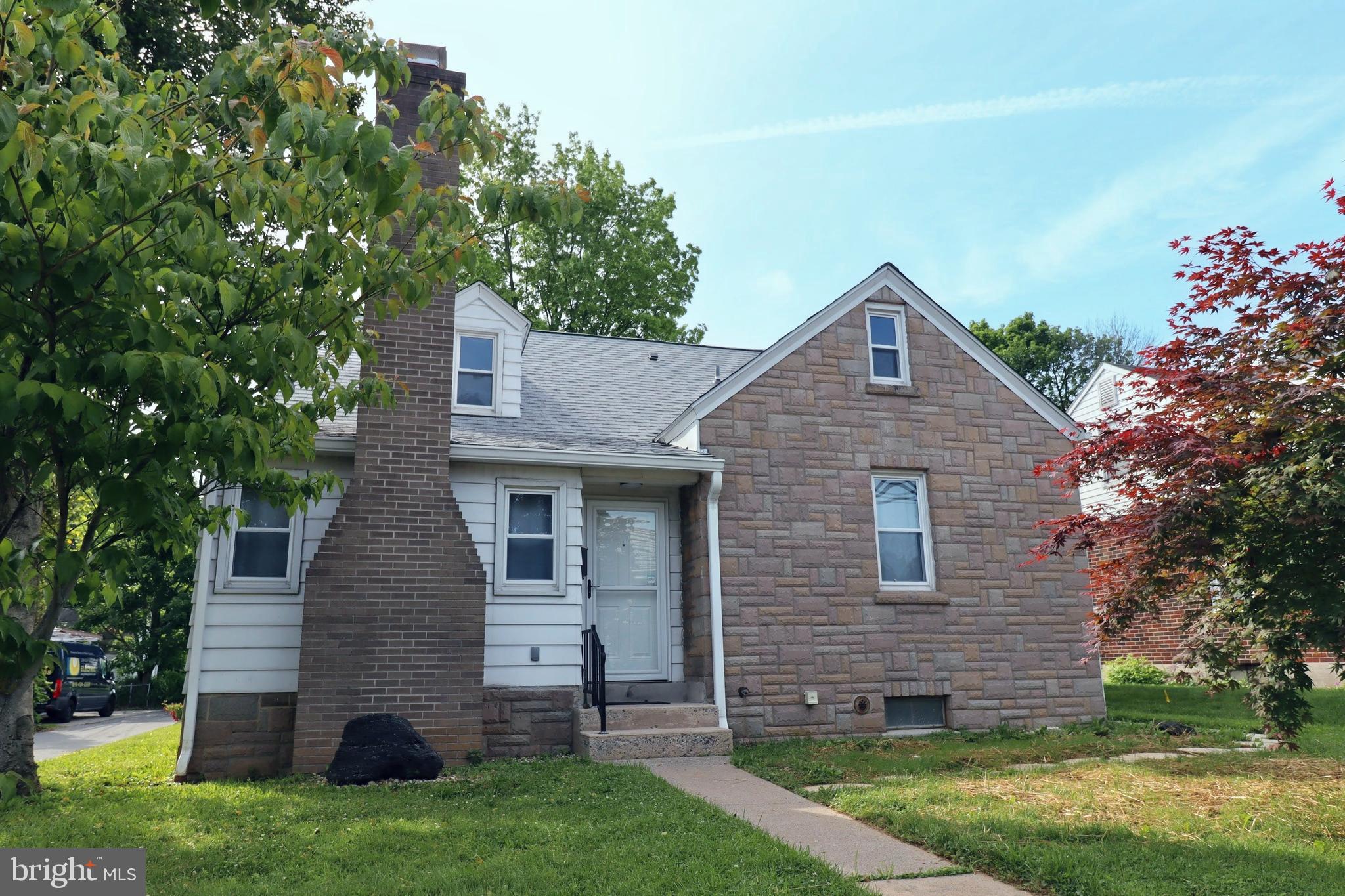 Discover timeless charm in this delightful Emmaus Borough residence, where classic architectural elements meet comfortable living. This East Penn four bedroom home boasts exceptional curb appeal, complemented by well-kept landscaping and mature trees. Step inside a welcoming living space anchored by a brick fireplace with a colorful tile hearth, all set upon warm hardwood flooring, perfect for cozy evenings. This spacious kitchen provides an abundance of natural light, featuring white cabinetry, ample granite counter space. Practicality is evident throughout, with a first floor primary bedroom and thoughtful details like a cedar-lined closet offering aromatic and functional storage. The backyard features a 2-car garage and fruit trees; 3 different varieties of apple trees, a pear tree, a sour cherry tree and a fig tree. The home also features gas heat, central air, replacement windows and a new roof which was installed in 2026.
