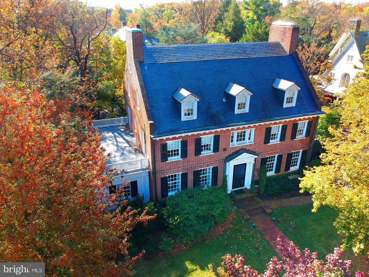 Open Sunday, Sept. 22nd 1:00-4:00 Desirably located on prestigious block of Greenway of architecturally significant homes close to Sherwood Gardens. Perfectly designed for entertaining indoors & out, this elegant & spacious, light-filled home w/high ceilings, 2 FPs & great flow features a landscaped, fenced, private oasis of a yard w/pool area. Magnificent living rm w/space for dining table, if desired. Handsome kitchen w/dark granite dining peninsula & butler's pantry area, gourmet appliances, and abundant cabinetry features large opening to dining rm w/FP which, if preferred, can function as a family room. Lovely master suite w/decorative FP, 2 sizable walk-in closets and spacious bath w/separate tub and shower. 2nd bedroom on 2nd floor w/private full bath, currently an office w/custom wood cabinets, accesses the balcony. 3rd 2nd floor bedroom has a newer bath & balcony access. Third level features 2 bdrms, 2 baths, sitting & exercise rooms. Beautifully customized 1st floor sunrm leads to awning covered patio. Spacious basement w/recreation room, workshop, bath and second laundry area. Charming studio room over garage.