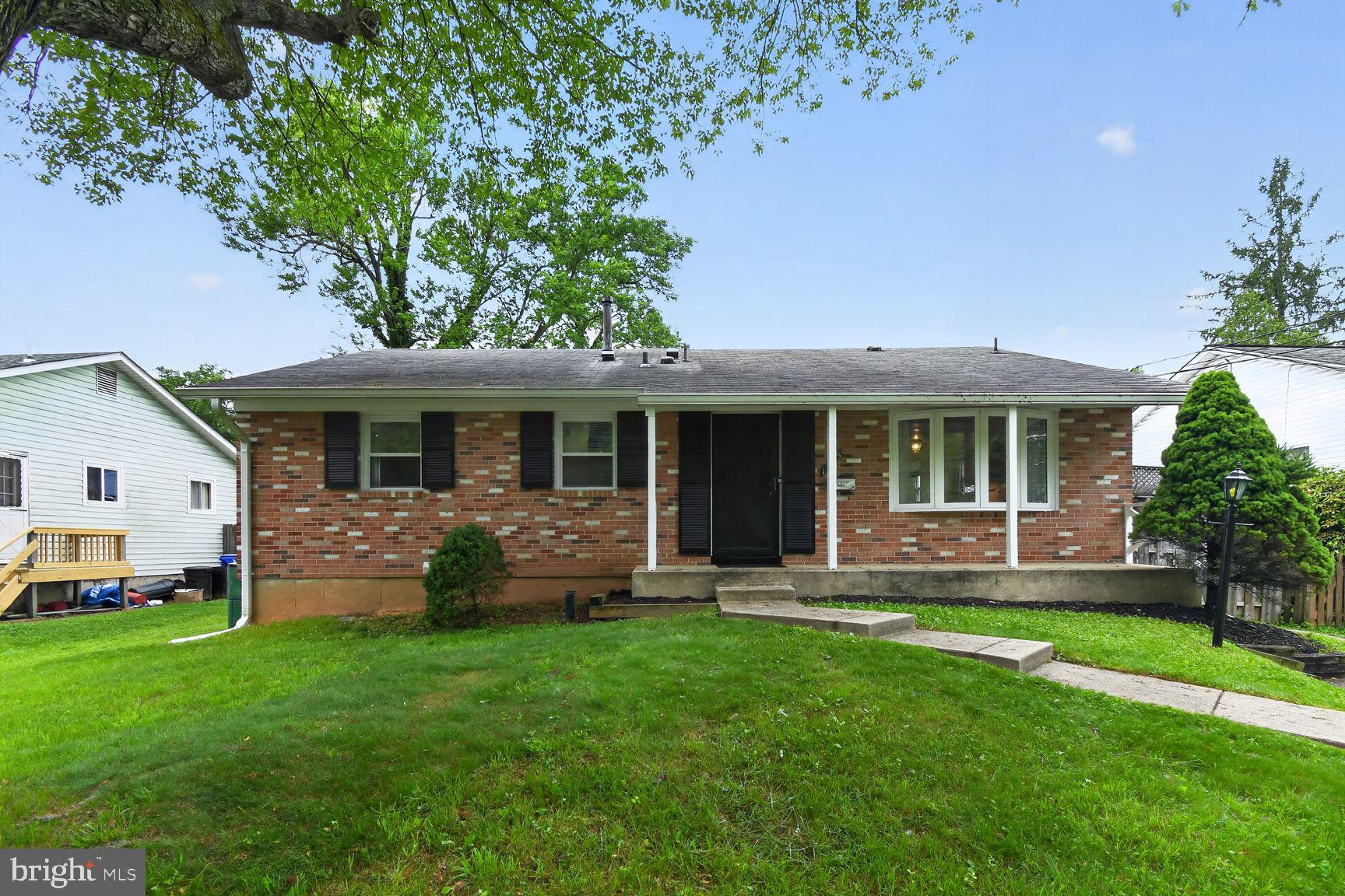 Welcome to your new home in Harmony Hills - this is THE ONE you've been looking for! Beautifully maintained brick front rambler with an in-ground pool in a prime location backing to convenience and recreation! This move-in ready home offers 3 bedrooms, 3 full bathrooms, and a spacious lower level office/multipurpose room perfect for working from home, guests, or hobbies. The kitchen features a gas stove, new energy efficient stainless steel refrigerator, and table space beside a sunny bay window. An open living and dining area overlooks the private rear yard through a large bay window and sliding glass door leading to the full-size in-ground pool with concrete surround, gas grill, and privacy fencing - ideal for entertaining and summer relaxation. Hardwood floors span the main level, while the lower level recreation room and office are comfortably carpeted. The rec room is highlighted by a cozy wood burning fireplace with brick surround and hearth. Additional lower level unfinished space includes washer & dryer, abundant storage, and a side exit door. Ideally situated directly across from Matthew Henson State Park with paved trails and bike paths connecting to Rock Creek Park Trail. Located on a no through street and just minutes to Glenmont Metro, public bus service, shopping, dining, parks, and public and private schools. Easy to show - don’t miss this opportunity!
