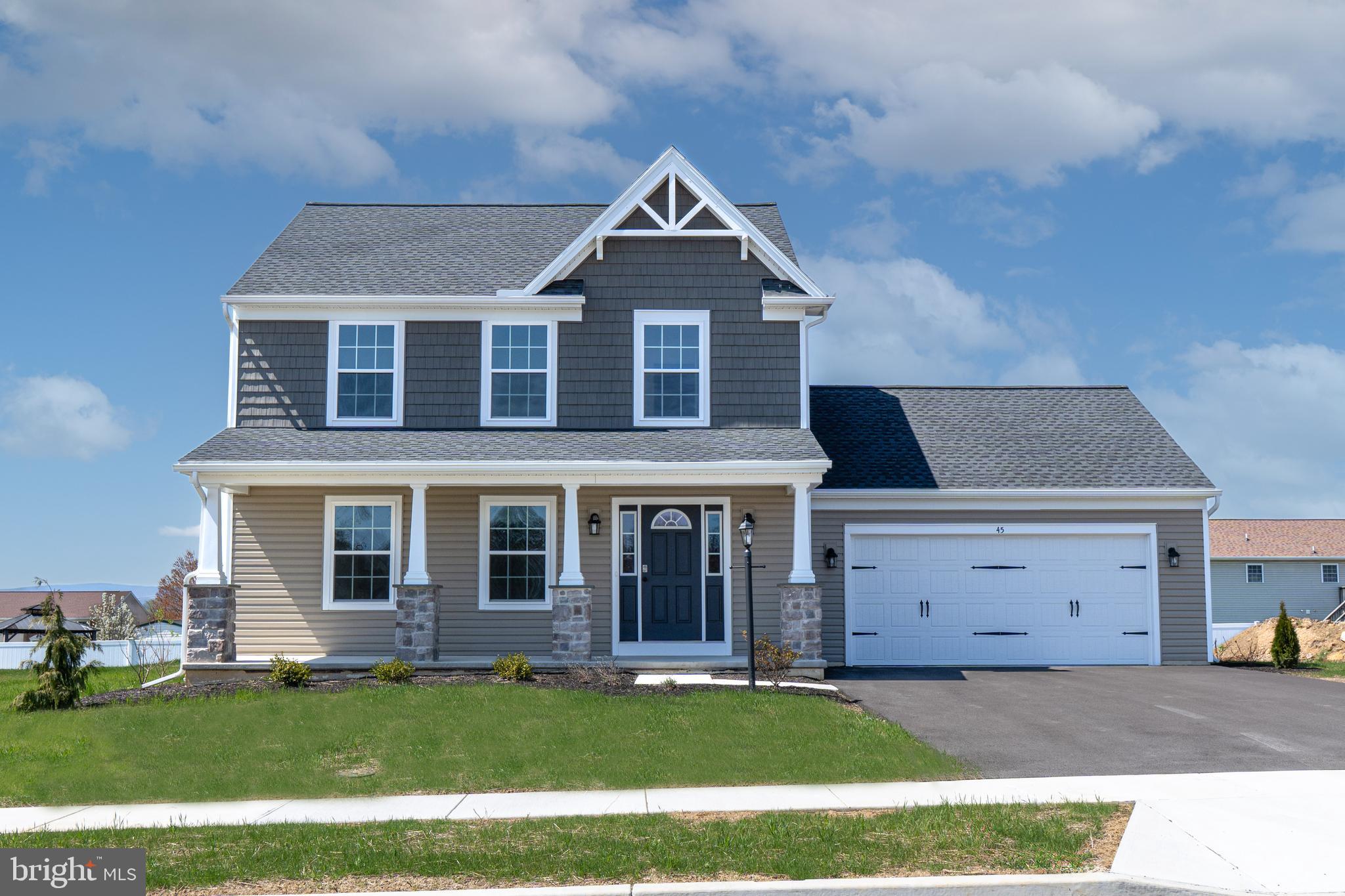 Located in Biglerville, PA, 7 miles north of Gettysburg, this Monroe C home in Appleview Estates offers a single-family layout on a homesite between 0.25 and 0.5 acres. Convenient access to Route 15 and Route 30 allows commuting to Carlisle, Harrisburg, York, and Northern Maryland. Nearby are local shops, bakeries, farmers’ markets, the National Apple Museum, and the Historic Round Barn.

The home features a Craftsman-style exterior, covered front porch, and two-car garage. The kitchen includes white upper and lower cabinets, a contrasting island with overhang, granite countertops, and black Whirlpool appliances including a smooth-top electric range, microwave, and dishwasher. Wafer LED lighting is installed throughout, and LVT flooring is included in the foyer and kitchen/breakfast area.

The owner’s bath includes espresso cabinets, a cultured marble double vanity, linen closet, and walk-in shower with corner shelves. Additional features include a second-floor laundry room and a full unfinished basement with an egress window.

Schedule your tour today and see everything this home has to offer.