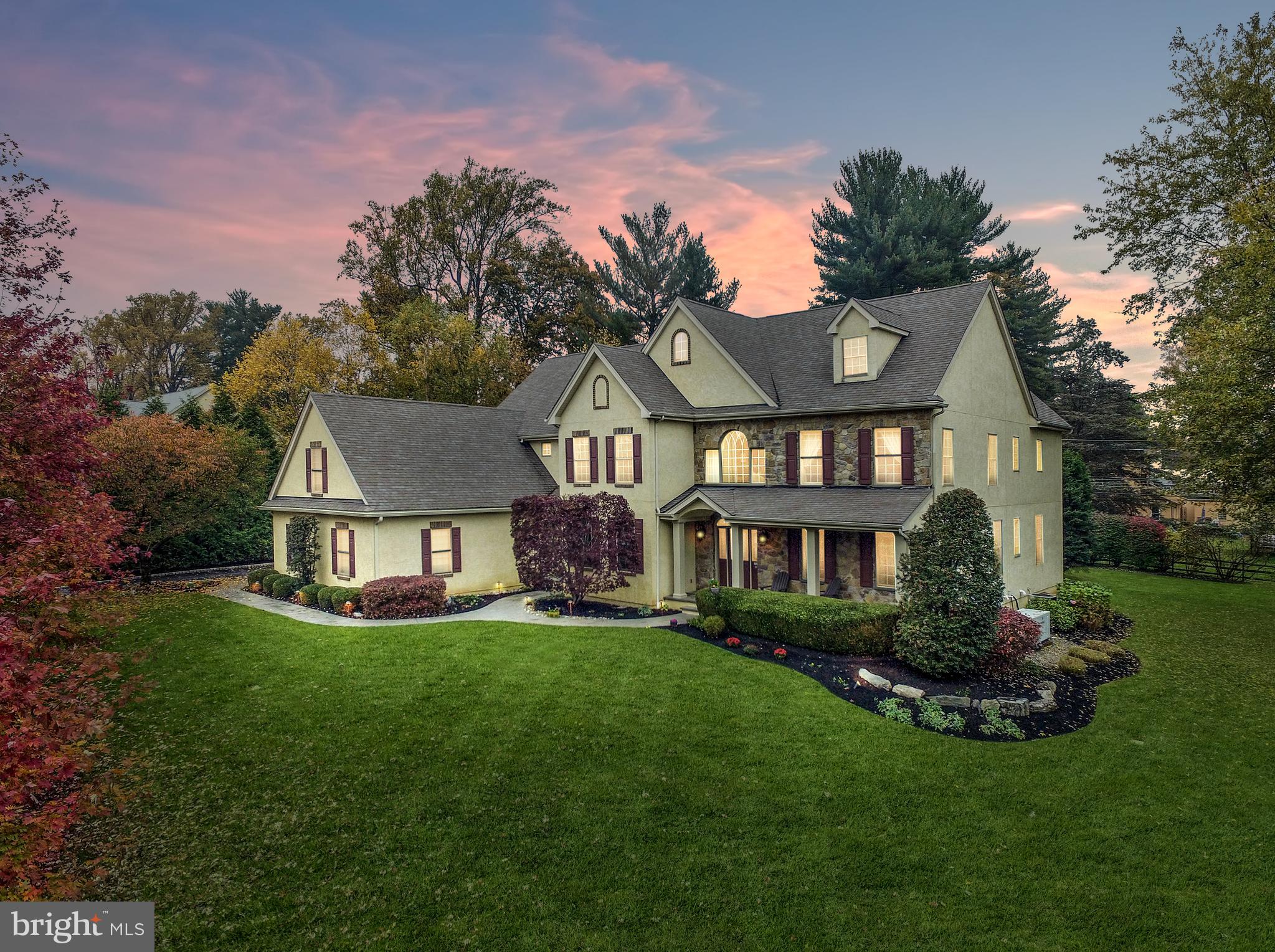 Prepare to be captivated by the most magnificent home on the market anywhere in the Abington School District. Set on a gorgeous lot in a quiet tucked away cul-de-sac of just 10 homes in the Meadowbrook section of the township, 1041 Laurel Hill Lane is a hidden gem that delivers an unparalleled lifestyle experience. With over 5,600 sq. ft. of finished space, this immaculate mint, move-in condition turnkey home leaves nothing to be desired. A triumph of design, comfort and convenience, the initial approach emanates understated luxury, setting the tone for the quality of craftmanship and ease of functionality that you will encounter throughout the home. The perfectly laid brand new stamped concrete walkway and lush, immaculate landscaping are your first clues as to what lies ahead. The foyer entry reveals a sprawling straight through view, gleaming and substantial white mill work and raised panel moldings by the finest artisans, impressive tile and gleaming Brazilian Cherry hardwood floors, and gorgeous oak tread staircase with traditional white balusters and oak railing. To the right lies the formal living room, to the right a gracious formal dining room. Continuing to the gourmet kitchen, it is a culinary enthusiast’s dream. Offering every convenience, it is replete with large double tiered center island seating for 4, granite counters, tile backsplash, five burner gas cooktop, two sinks and two dishwashers, wall oven/microwave/warming tray, wine fridge, large pantry and second counter top. The adjoining breakfast room is enormous, featuring cathedral ceiling, walls of windows, and egress to the rear 638 Sq. ft. patio. The kitchen opens to the Family/Great room, featuring a higher ceiling, gas log fireplace w/detailed mantle and marble surround. Retreat to the library/office, with wall of built ins and French door egress to the patio as well. The open first floor floorplan is designed perfectly for everyday living as well as sophisticated entertaining for any occasion. There is a mud room with utility sink, two powder rooms, rear staircase, ample closet and storage space to complete the main floor. The magnificent Primary Suite features a sitting room entry, spacious bedroom with beautiful tray ceiling, automatic shades, elegant fireplace, his and hers walk-in closets. The Primary Bath features a large gorgeous shower, neutral tile, separate vanities w/granite counters, large jetted tub, and private toilet closet. The upper level also features large bedrooms 2 (with attached semi private bath), 3 and 4 share a Jack and Jill bathroom, and bedroom 5 accesses the semi-private bath from the main hallway. Bedroom 5 also has access to a large floored attic. The laundry room is conveniently located on this level as well. The walk up third floor attic can be finished for a 6th bedroom or additional common use space. The lower level of the home features a large finished footprint w/ entertainment/lounge/game area, gym room, powder room, staircase directly to the garage, and 3 separate spacious storage/utility areas. Adding to the lure of this impressive offering, additional outstanding features of the home and property include backup generator, ample recessed lighting and elegant light fixtures, security system, multi zone HVAC, two water heaters (one tankless) 3 car garage, lush landscaping including a plush lawn, multi zone irrigation, mature pine and leaf trees and Belgian bock driveway curtain. The home and property have been lovingly maintained by the original owners. One visit and you will most definitely want to become the second ones! Enjoy a carefree lifestyle with everything that idyllic Montgomery County has to offer. Conveniently located just minutes to the Meadowbrook Septa Station, Jenkintown, Huntingdon Valley, Willow Grove, PA Turnpike.
