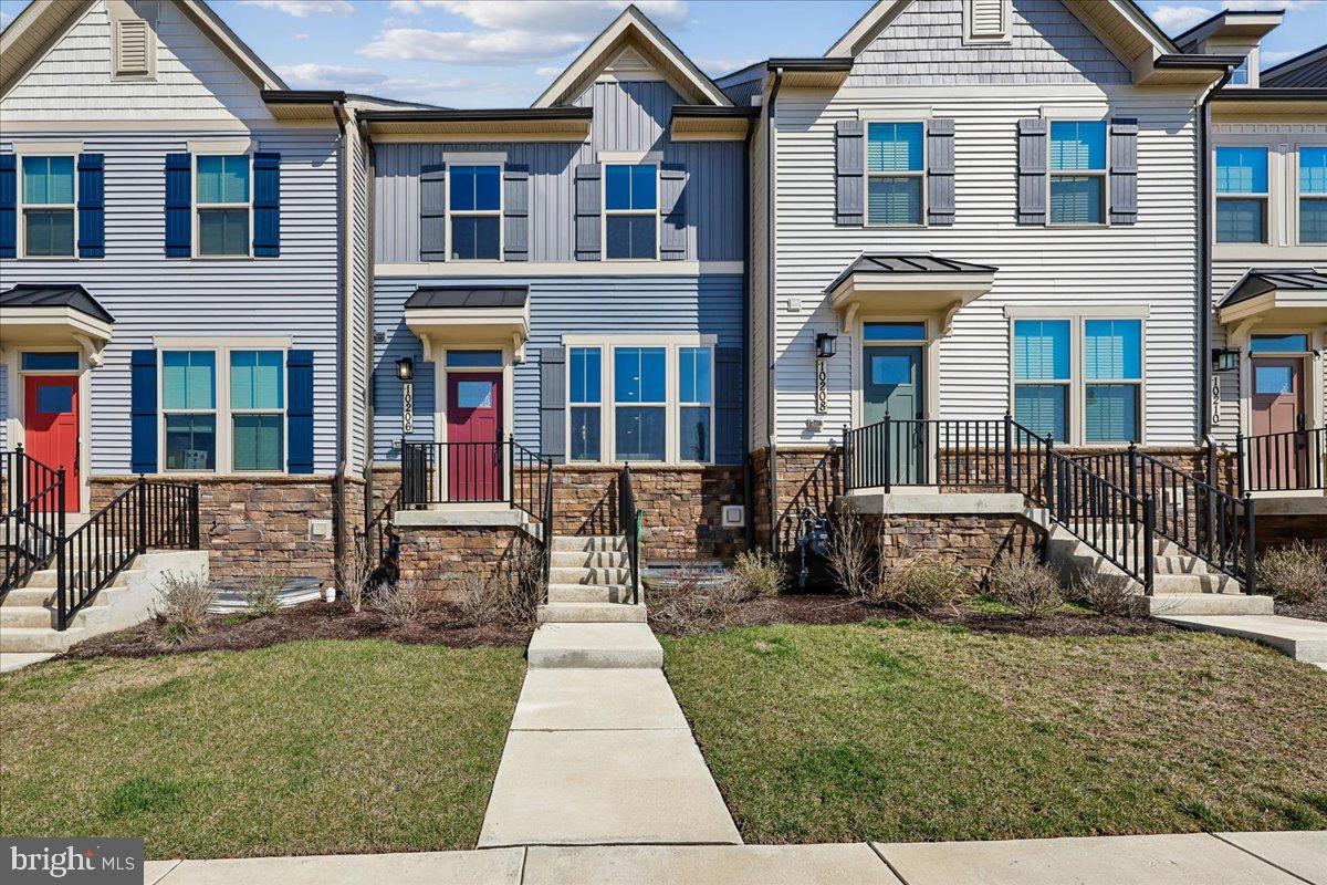 Welcome to this beautiful, nearly new townhome in the highly desirable Lake Linganore Community of New Market, Maryland. Built in 2024, this spacious home offers modern living with an open-concept layout, featuring a bright living area, dining space, and a gourmet kitchen with upgraded appliances, ample cabinetry, and a large center island.

The upper level includes a luxurious primary suite with a private bath and walk-in closet, along with additional bedrooms and full bathrooms. The lower level offers a private bedroom, full bath, and access to the attached two-car garage, providing flexibility for guests or a home office.

Enjoy resort-style community amenities, including private lake access, multiple outdoor pools, sandy beaches, walking and biking trails, tennis and basketball courts, playgrounds, community events, and farmers markets. Conveniently located near Downtown Frederick and major commuter routes including I-70, this move-in-ready home also includes a whole-house water softener, window blinds, and access to the community pool. Experience the perfect blend of modern comfort and exceptional community living.