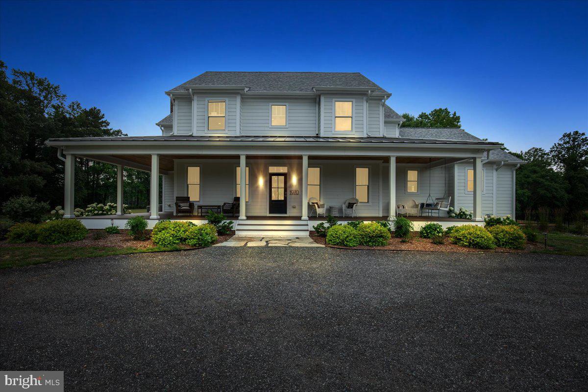 Embrace a sophisticated approach to coastal country living at 1970 Old Anchor Lane. Masterfully designed with a Southern Living farmhouse aesthetic, this estate commands 33.2 acres of diverse Maryland landscape, framed by an extraordinary 1,636 linear feet of direct water frontage. Built to enduring standards, the residence features premium Hardie siding and high-performance Anderson windows, accented by a classic wrap-around deck that captures gentle breezes and expansive aquatic views.

The interior layout honors both grand-scale hosting and everyday functionality. The high-end chef's kitchen is a culinary anchor, balancing extensive counter space with premium appliances and a seamless transition into a fully equipped butler's pantry. Designed with modern logistics in mind, the floor plan boasts dual laundry facilities located on both the main level and the upper bedroom story.

The main level primary suite is a masterclass in spatial design—an expansive sanctuary complete with an elegant en-suite bathroom, multiple oversized walk-in closets, and direct access to laundry facilities. Additional living space awaits in the full, unfinished basement, which comes pre-plumbed for a bathroom and a full wet bar, ready for your tailored design.

Outside, the property transitions into an absolute paradise for nature enthusiasts and sports lovers alike. The immediate backyard serves as a blank canvas capable of hosting a custom pool and a pickleball court. Beyond the lawn, the extensive shoreline and acreage encompass a rich marsh ecosystem featuring two private islands and abundant local wildlife, from deer and wild turkeys to migratory waterfowl. A newly installed pier offers immediate, deep-water access for watercraft, completing this rare waterfront offering. Furthermore, the purchaser secures the first right of refusal on additional adjoining building lots.