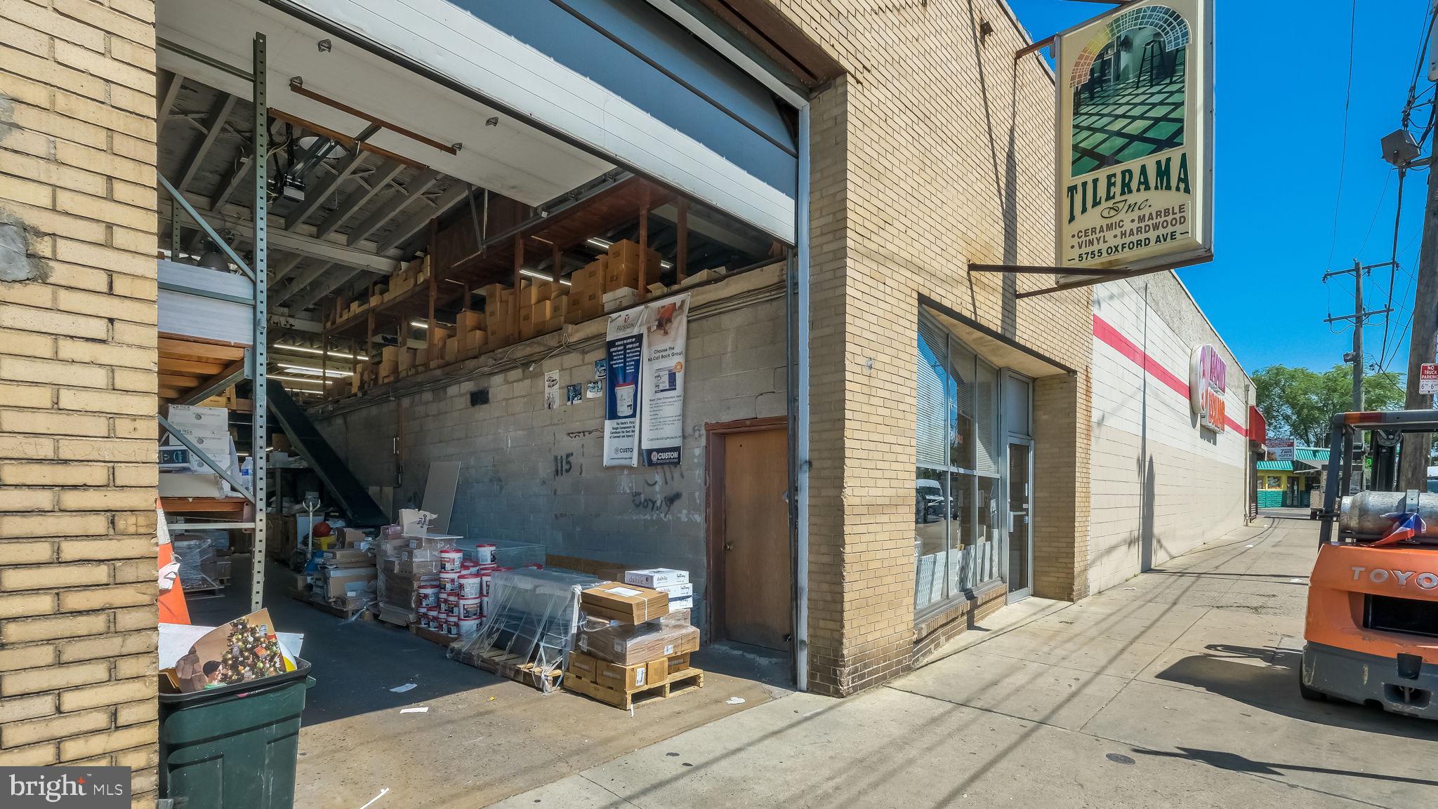 BUSINESS AND REAL ESTATE FOR SALE.  TOTAL PRICE $600,000.  Introducing a fantastic commercial property investment opportunity at 5755 Oxford Avenue, Philadelphia, Pennsylvania, 19149. This prime retail space is situated in the heart of the bustling Oxford Circle retail business district and features a well-established, profitable tile supply business with a loyal customer base from all over the city. With the owner looking to retire, this is a unique chance for real estate investors and business entrepreneurs to capitalize on this thriving business.

This .08 acre property boasts a spacious 3,506 square foot commercial building comprising a retail showroom, office space, and warehouse storage. It also offers a 12-foot overhead drive-in door for convenient customer loading and unloading and store deliveries, as well as mezzanine storage and a conveyor system for inventory storage.

Notable features of the property include a large retail window, a retail sign.  The business has many longstanding commercial and retail accounts. Equipment, inventory, and trained employees are available for a smooth transition.

The property is ideally located close to Saint Michael of Tours Catholic Church and School, next to a variety of popular retail establishments such as Dollar General Store, Family Dollar Store, Oxford Avenue Produce Center, Dunkin Donuts, Auto Sound Tire Shop, Sunoco Gas Station, and 2000 Nails Salon. There is plenty of on-street parking available for customers.

Built in 1950, the well-maintained property has central A/C, natural gas forced air heat, adequate electric service, and a flat roof. It is zoned CMX2 and has quick access to Roosevelt Boulevard Route 1 and I-76. Annual taxes are $5,109. Don't miss out on this outstanding investment opportunity in the Oxford Circle section of Philadelphia!
