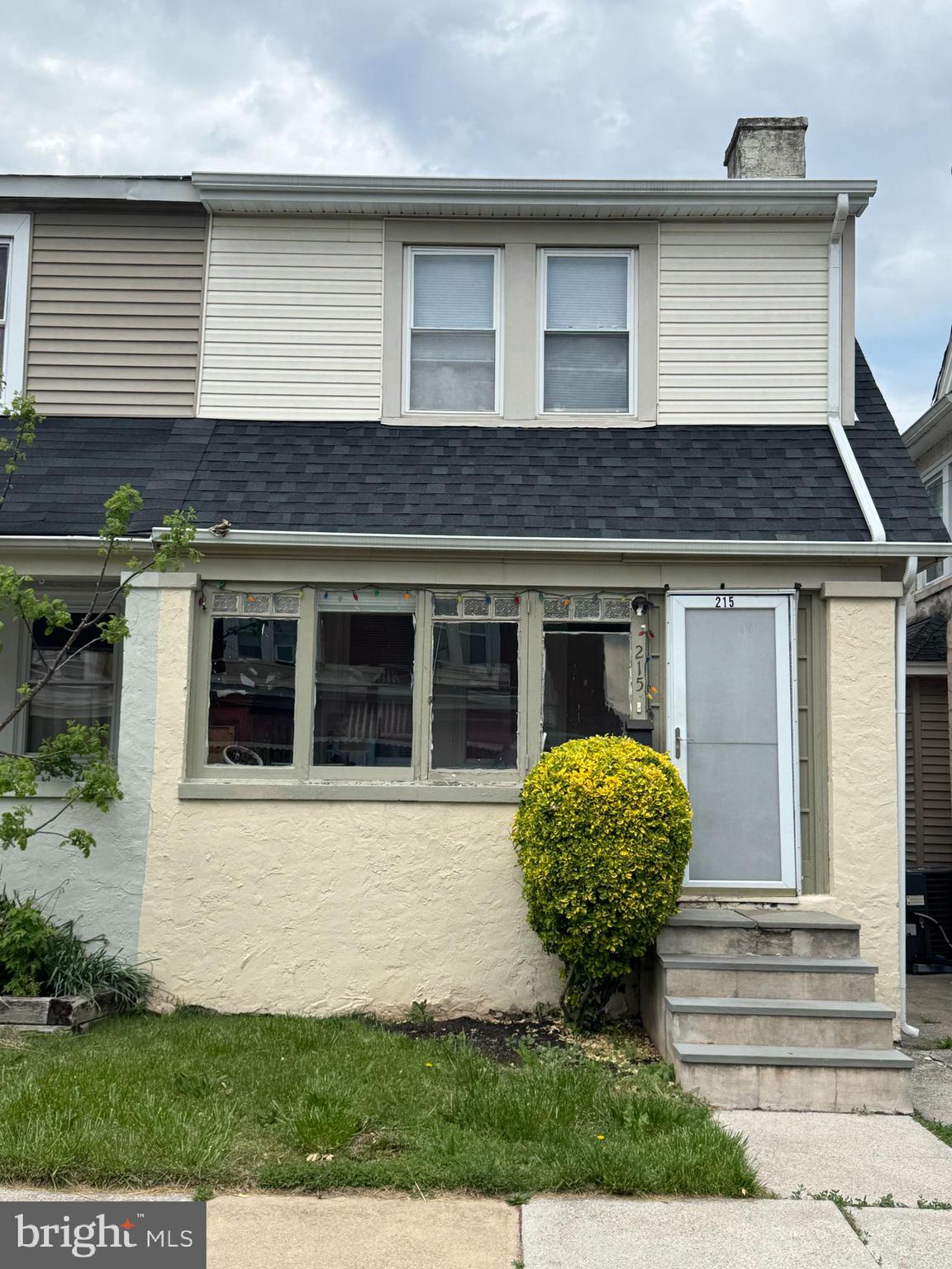 This 3-bedroom twin home blends character with opportunity. As you approach, you’re welcomed by an enclosed front porch—unheated and without electric, but perfect for enjoying spring mornings or storing seasonal items. Step inside and you’ll find a cozy layout, highlighted by a non-functioning fireplace that still adds a touch of charm.

In the back, a small covered porch offers a peaceful spot to unwind, and just beyond it, there’s convenient off-street parking for two vehicles. The home sits atop a full unfinished basement, offering plenty of room for storage or potential workspace.

While the home currently uses electric heat, it remains plumbed for oil, giving the new owner flexibility for future upgrades. The roof was installed around 2023, providing peace of mind for years to come. With a long-term tenant already in place, this property presents an excellent opportunity for steady rental income or a future owner-occupant looking to make it their own.