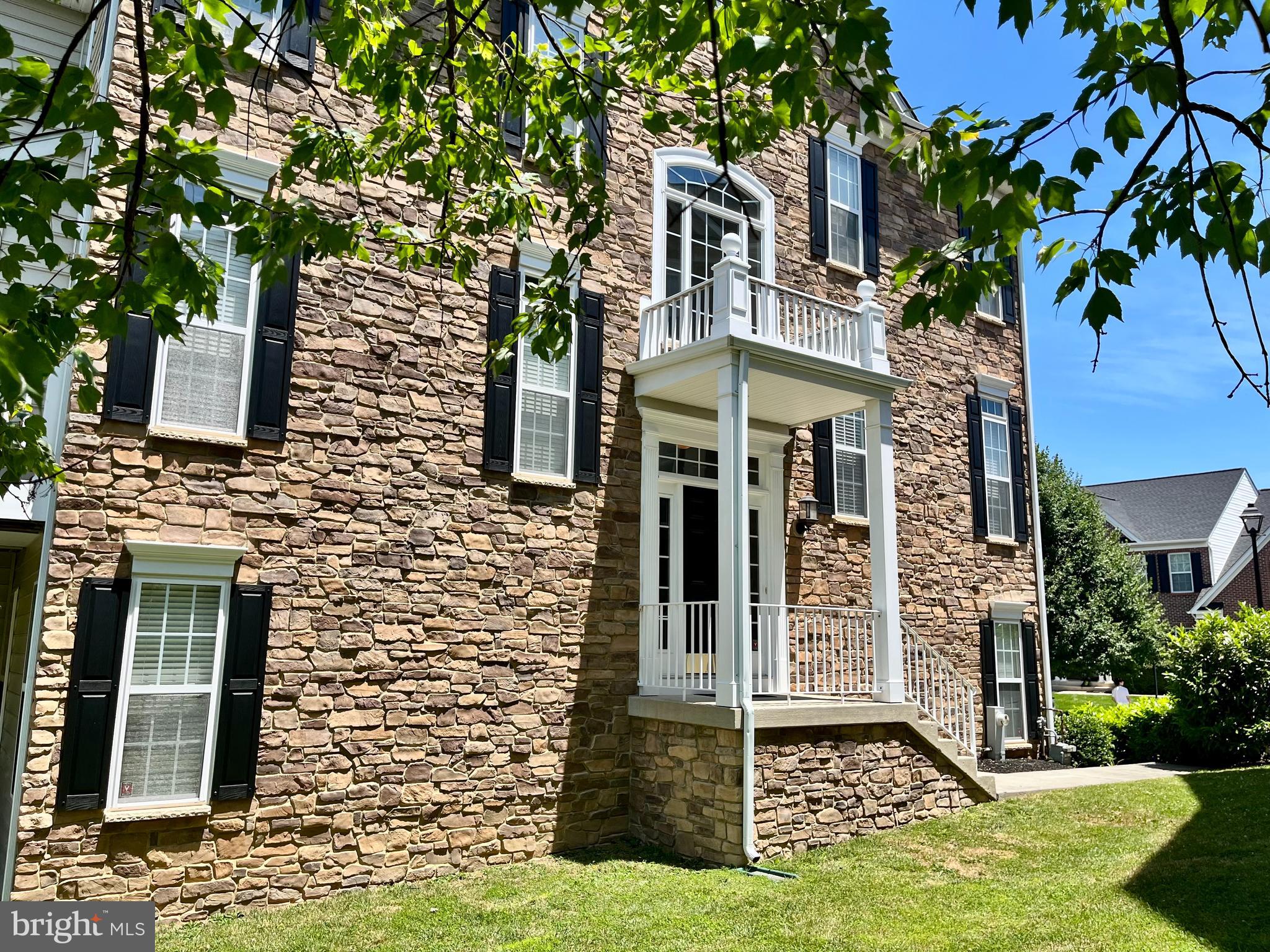 VOUCHERS ARE ACCEPTED IN ALL OF HOWARD COUNTY RENTALS, BUT this owner wants a strong 700+ credit score requested and pets on a case by case. Pet charge of $40 per month.  You’ll look forward to coming home! Enjoy dinner on the secluded deck of this beautiful end unit townhome in the Taylor Village community. The 4 bedroom 3.5 bath unit has hardwood flooring throughout the main level complimenting the open, light and airy floor plan. Main level houses a gourmet kitchen with top of the line appliances, granite countertops, oversized cabinets and opens into the living and dining rooms making your entertainment possibilities endless. Private front office with French doors off the living room. The primary bedroom boasts two walk-in closets, tray ceiling, crown molding and a large ensuite bathroom with dual sinks, a large vanity and a soaking garden tub. The lower level offers a separate space for you to use as another bedroom plus additional room for tons of other options in the finished basement. The home is well maintained with newer HVAC, hot water heater, washing machine (2025) and dishwasher. A two car garage with additional spaces for cars to park on your driveway. Just minutes to historic old town Ellicott City, shopping, schools and major highways. The neighborhood boasts a pool, playground, tennis courts, and fitness center. Preference given to longer term leases.
