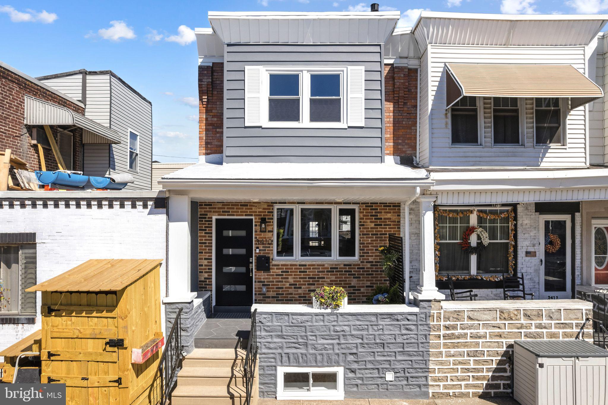 In the heart of port Richmond and in the most desirable quiet neighborhood you are welcomed to step inside at 3410 almond st. 
This beautifully designed home is the perfect blend of modern style and elevated comfort.
You’re greeted by sleek tile designed , spacious front porch. Step inside the custom front door into the living space, boasting about 1700 sq of open space layout. The first floor unveils a custom accent wall with reclaimed accents, exquisite trim work, custom lighting, real hard wood floors, broad window that lets in an abundance of natural lighting, high ceilings, and stunning custom contemporary style electric fire place.,
Glide into the kitchen area, offering brand new stainless steel appliance package, two toned white and grey cabinetry, breakfast nook, quartz counter top and stylish tile work that flows together with perfection. Thoughtfulness to accessibility and to exquisite design is what is in the rear of the home , a full bathroom with stand in shower, so you don’t need to walk to the second floor. Designed with a pop of color, stunning tile work, modern vanity and high end finishes. Also you have a spacious backyard, perfect for evenings relaxing or entertaining friends and family. The basement is spacious and fully finished offering an extra bedroom, or limitless living area ideas, gym, family room, office etc…
Ascend to the upper level on a custom iron rod railing, floating staircase, to find three spacious bedrooms with immense amount of closet space, custom accent walls, hallway stacked washer dryer combo, hallway full bathroom with custom glass shower door, sleek tile work, modern vanity.
This home is hot!!!!! It is priced just right! 
Close to public transportation, walking distance to local favorite spots. Stop by today !