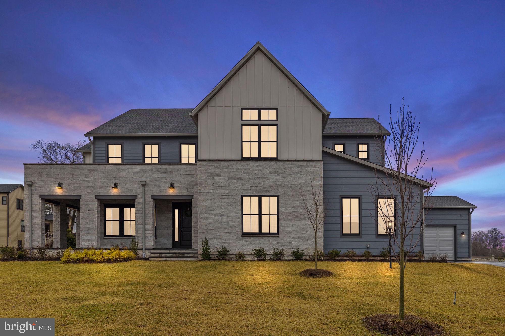 Exceptional modern/contemporary new construction without the wait! This property is enriched with approximately $500K worth of premium finishes and structural upgrades. The Warhol Modern Farmhouse boasts an open floor plan with 6 bedroom suites and 6 full, 2 half baths, spanning 9,515 square feet, nestled on 0.85 acres, fenced, newly landscaped and at the end of a cul-de-sac with a 5-car garage. Experience convenience at its best with this offering, just minutes away from Tysons Corner, Greensboro Metro Stops, Washington DC shopping, entertainment, and dining! Step into the grand 2-Story foyer that welcomes guests with an impressive turned staircase adorned with sleek glass railings, creating a modern and elegant focal point in this luxurious home. The main level features a gourmet primary kitchen with a stunning quartz waterfall island, high-end appliances, a second full prep kitchen, dream pantry, study, main level bedroom suite, indoor/outdoor covered porch with retractable screen, integrated space heaters, and fireplace, laundry suite, formal dining room, butler’s pantry, and a great room with a fireplace. The upper level living quarters offer 4 bedroom suites, with the primary suite featuring a veranda, walk-in closets, and a premium owner’s spa bath retreat. Additionally, there is a loft/family room for gaming and a second spacious laundry suite with built-ins. The walk-up lower level boasts an entertainer's dream basement with upgraded flooring, 10-foot ceiling upgrade, a 6th bedroom suite, media room, hobby room, and a spacious recreation/gaming area with a full wet bar rough-in. This estate is ideal for multi-generational living. With-in the top-rated Spring Hill/Cooper/Langley pyramid.  New Fence and  Irrigation System and Professional Landscaping installed (2024).  Don't miss out on this well priced OPPORTUNITY!