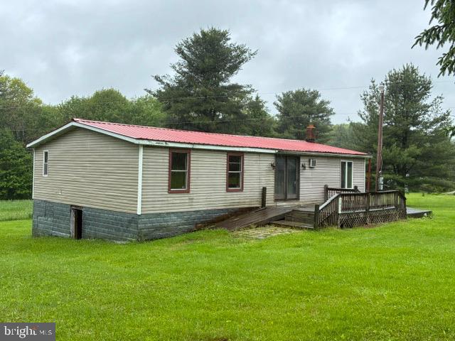 SOLD AS IS ! 3 Bedroom 2 Bath Double Wide Trailer. Fixer upper potential! Spring as the water source and septic system in place. Perfect for a project, great price tag!