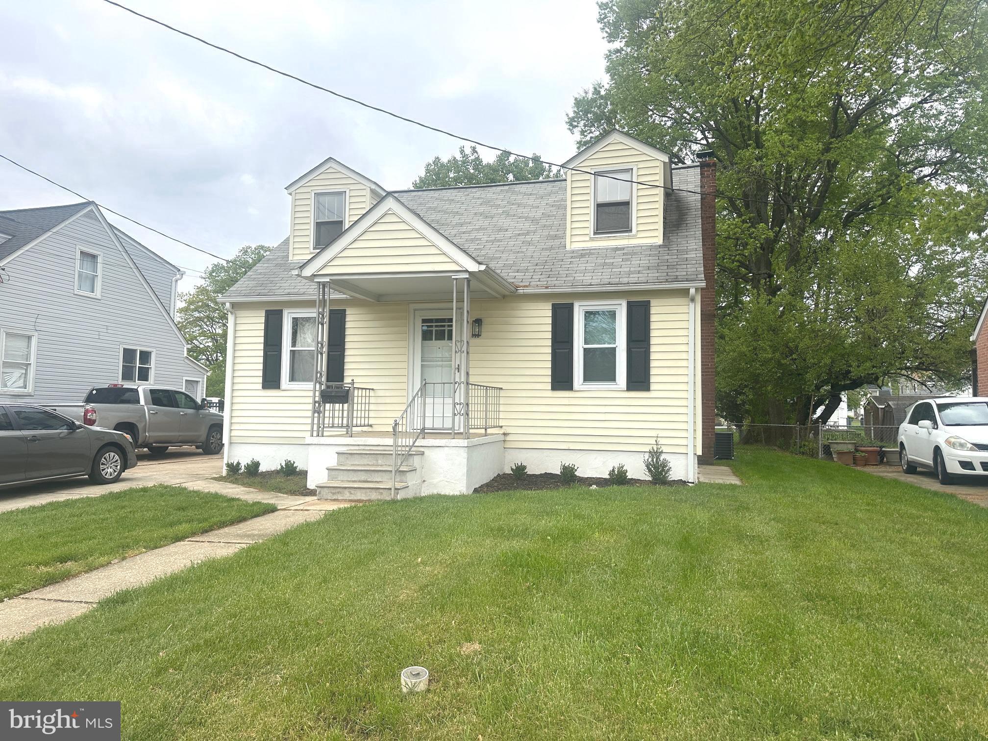 $10,000 price improvement!!! Charming 4-bedroom, 3 full bath newly refurbished Cape Cod featuring a brand-new kitchen with white cabinetry with crown molding, ceramic tile backsplash, quartz countertops, and stainless steel appliances. Updates throughout include new luxury vinyl plank flooring, fresh paint, and modern light fixtures. Enjoy year-round comfort with a new furnace and central air conditioning. Main level offers convenient laundry and a private ensuite with roll-in shower. Professionally waterproofed basement with lifetime warranty just completed even exterior exit to rear yard. Maintenance-free exterior with gutter helmets, plus a covered front porch, deck, and patio overlooking a private fenced rear yard. Ideally located close to shopping, dining, and major commuter routes. This house has been lovingly maintained by the same family for decades. Nothing to do just move in and relax.
