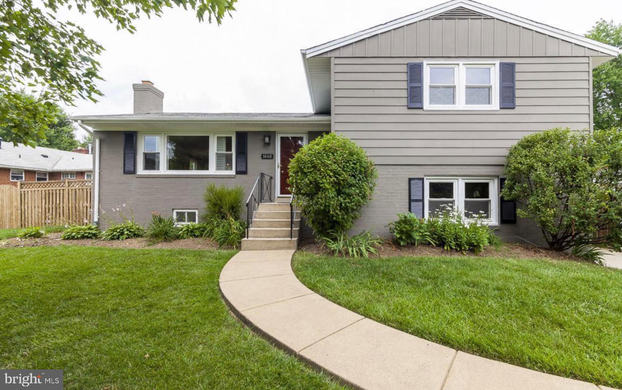 Welcome to 1640 Warner Ave, a charming split-level home nestled in the heart of McLean, VA. This residence offers a blend of modern updates and classic design, providing a comfortable and stylish living environment. 
The upper level boasts three spacious bedrooms and two full bathrooms, all featuring Elfa closet systems for optimized storage. The ground level includes a large family room and a versatile flex room with its own full bath, ideal for guests or a home office. The fully finished basement offers a recreation room and an additional bedroom or den, providing ample space for various needs.
The open-concept kitchen is equipped with granite countertops and stainless steel appliances, seamlessly integrating with the main living areas to facilitate easy entertaining and daily living. Hardwood floors run throughout the home, enhancing its warm and inviting atmosphere. The open floor plan allows for natural light to fill the space, creating a bright and airy ambiance.
A new roof has been installed, ensuring durability and peace of mind for future homeowners.  All bathrooms have been updated to reflect contemporary styles and fixtures, adding to the home's modern appeal.
Situated on a 0.29-acre lot, the property features a stone patio, perfect for outdoor dining and relaxation. The surrounding yard offers potential for gardening and outdoor activities.  The home includes an attached carport, providing convenient and covered parking for residents.
Location, Location, Location! This is one of McLean’s most conveniently located neighborhoods.  Residents can enjoy easy access to local shops, parks, and dining options in the vibrant McLean community. The neighborhood offers a blend of suburban tranquility and urban conveniences.  With close proximity to major commuter routes and public transportation, including the McLean Metro station, this location provides straightforward commutes to Washington, D.C., and surrounding areas.