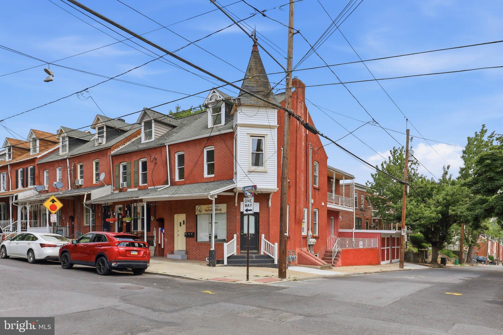 Exceptional mixed-use investment opportunity offering immediate income with additional upside potential. This well-maintained three-unit commercial property features a street-level commercial space, currently occupied by a single-chair salon, along with two residential apartments and two detached garages.

The residential units include a spacious one-bedroom apartment currently leased for $900 per month and a vacant two- to three-bedroom apartment that was previously rented for $1,500 per month, providing an excellent opportunity for an owner-occupant or the ability to increase cash flow immediately. The commercial salon space is leased for $575 per month, creating a diversified income stream.

The property has seen several important updates, including nearly all replacement windows and a Lead Safe Certification obtained through the city last year, offering added value and peace of mind. Both residential units include existing washer and dryer hookups that can easily be exposed again, providing a desirable amenity for future tenants.

The owner currently pays water, sewer, trash, and common area electric. With two garages providing additional storage or rental potential, stable existing tenants, and a vacant unit ready for occupancy or lease, this property presents an excellent opportunity for investors seeking both current income and future growth.