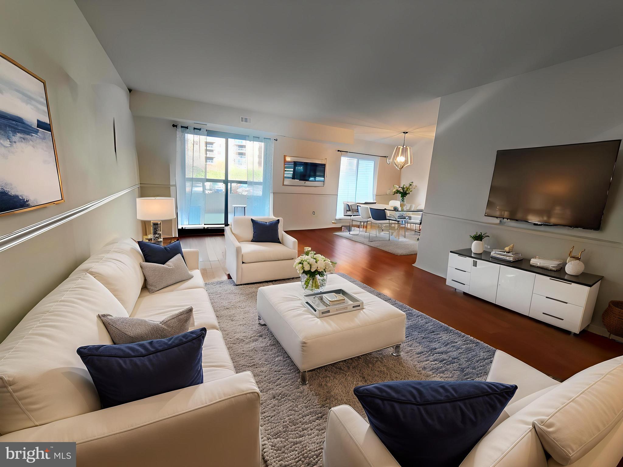 Attention Investors! This unit has excellent tenants with a lease that ends Feb 28, 2027. Located in the secure, gated 34-acre Rotonda pet-friendly community, this 1327 sqft , 2 bed/2 bath stunning home welcomes you with gleaming hardwoods in the open concept living and dining room and the 2nd bedroom. Huge master bedroom ensuite with two walk-in closets and master bath. Modern & Stylish Upgrades: - Updated master bathroom tiled shower, modern vanity in hall bath, renovated kitchen with newer stainless steel appliances *Electric cooktop *Dishwasher *Microwave oven *stackable washer/dryer. Exceptional Community & Amenities include Secure storage unit *Picturesque lakes & gazebo *Manicured walking trails *Gated dog park *Two playgrounds *Three sports courts *DIY car wash *Shaded picnic areas Unbeatable Location & Accessibility: Rotonda’s prime location is directly across from The Boro, featuring Whole Foods, a luxury theater, top-rated restaurants, and an authentic French bakery. It’s also on the Silver Line with two Metro stops and Kaiser Permanente within walking distance. Resort-Style Amenities: - Indoor heated pool & enormous outdoor pool connected to the domed Community Center - Library, study lounges, and business center - Gym, multipurpose room, and free Wi-Fi in the common areas -Ping pong, billiards, foosball, and saunas - Two unassigned parking spaces on surface lot & option to purchase garage parking spot for additional $25k (valued at 35k). Pet-friendly community. Don’t miss this incredible opportunity to live in one of the most sought-after gated communities with unbeatable amenities and location!