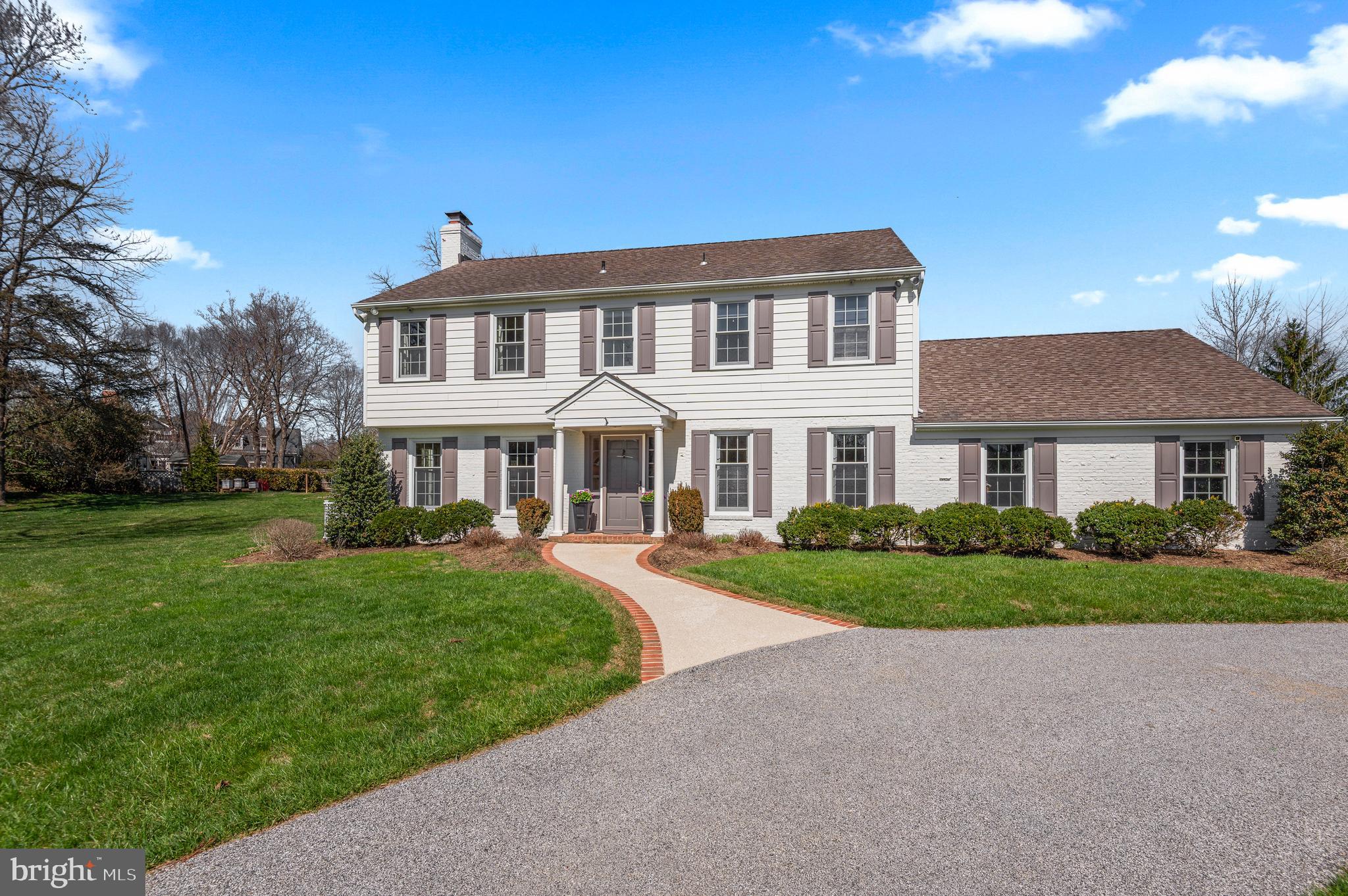 A rare opportunity in one of Baltimore's coveted neighborhoods.  Set  on a private one acre lot and ideally located this 5 Bedroom home includes a two-story addition that seamlessly blends timeless architecture with modern functionality.  The gracious foyer opens to a sophisticated living room with fireplace and a formal dining room adorned with custom millwork and crown molding.  At the heart of the home, the gourmet eat-in kitchen is designed for both everyday living and entertaining, featuring a generous island, six-burner gas range, dual sinks, and a dedicated beverage station complete with wine refrigeration and ice maker. The kitchen flows effortlessly into the  fabulous family room with fireplace and back staircase. French doors  open  to he welcoming screened porch. There is also a custom mudroom with a second powder room, stackable laundry for pool towels, and custom cabinetry. The upper level offers five spacious bedrooms, including a primary suite with a walk-in closet. A functional second-floor laundry room enhances daily living with ample cabinetry, a folding station, and a utility sink. The finished lower level provides versatile recreation and entertaining space, along with abundant storage and walk-out access to the grounds. Outdoor living is equally compelling, with a screened porch overlooking beautifully landscaped grounds and and in ground pool—creating a private retreat ideal for relaxation and entertaining. Additional features include Pella windows, Hardiplank siding, a circular driveway, and an attached two-car garage. Seamless flow and exceptional livability!