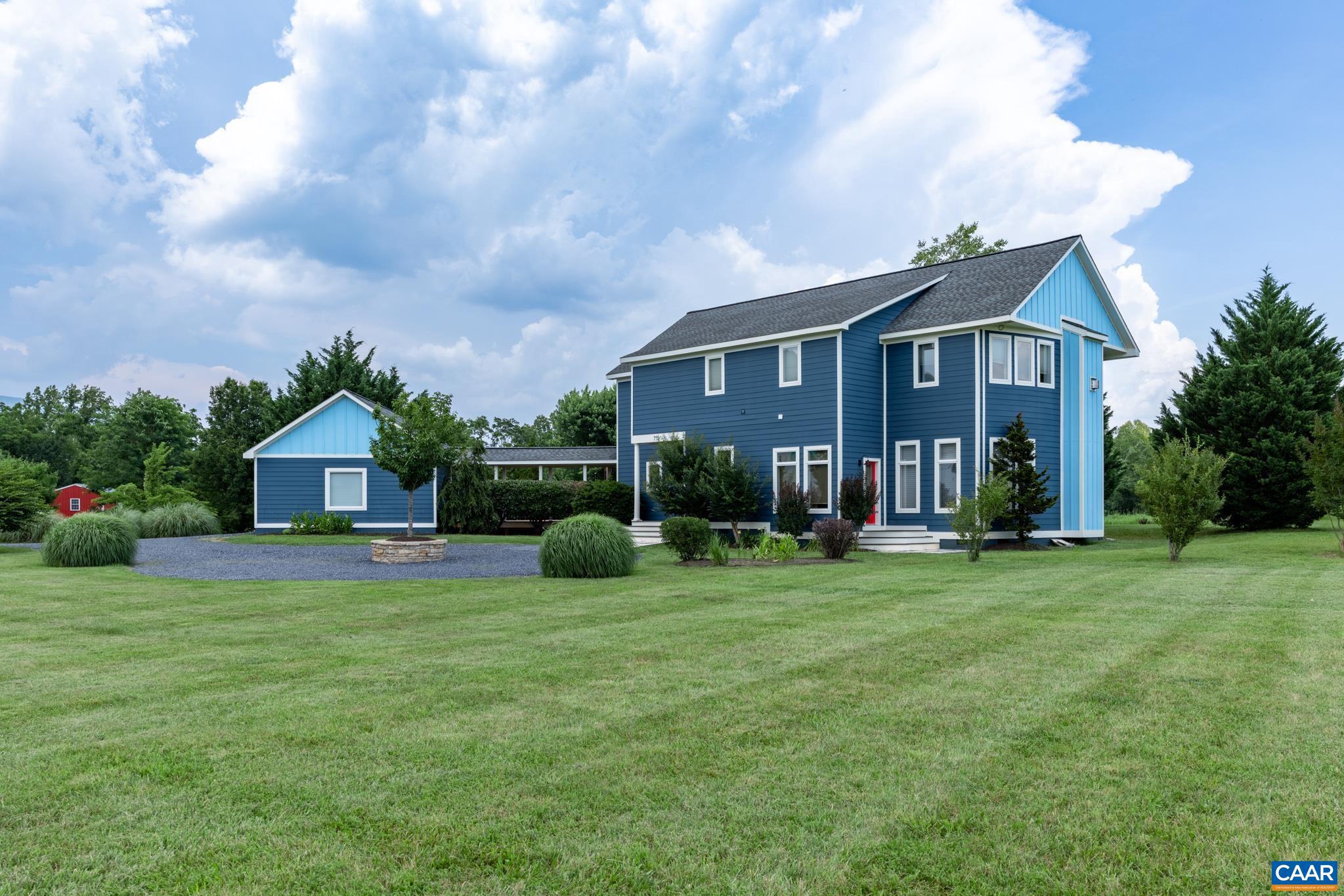 OPEN HOUSE SUN MAY 10, 12-4 pm! Welcome to this Quaint Historical Village Home Lifestyle! A Charlottesville's Coveted Suburban Community meets Luxury Modern Farmhse Living & nestled in the Foothill Mtns, surrounded by Equestrian Farms, Fine Estates & Wineries and only 15 min to UVA!  If you are seeking a property w/originality & character, a rural setting, your GEM awaits you! This 5 acre Oasis boasts a Main Home w/att 3 Car Garage, a 1 Bed/Ba Cottage, AND a Detchd 4 Bay Garage (w/lift) tucked in the Heart of Greenwood!  Architecturally designed/blt by Walter Bldrs,the 4 Bed/3.5 Bath Main Home has 3 Spacious Bed/Bath Ensuites on 2nd Flr. Entertaining is a breeze in your Gourmet Kitchen! You will love the Private Spacious Back Deck/Ctyard Area featuring a recently added Salt Water Hot Tub!The 4-Bay Detched Garage is ideal for collector cars/hobbies! Upgrades include recent HVACs, WtrHtrs, Generator etc. List attchd. Experience all this property has to offer in Wstrn Albermarle Cty?s Blue Ridge Mtn Region? where folks come to enjoy Historical Culture, blended with all the perks of breweries,wineries,antiquing,hiking, Blue Rdge Pkwy & Skyline Dr, and mins to all necessary amenities/shopping! An Airbnb Approved Property!,Painted Cabinets,Soapstone Counter,White Cabinets,Fireplace in Living Room,Fireplace in Master Bedroom