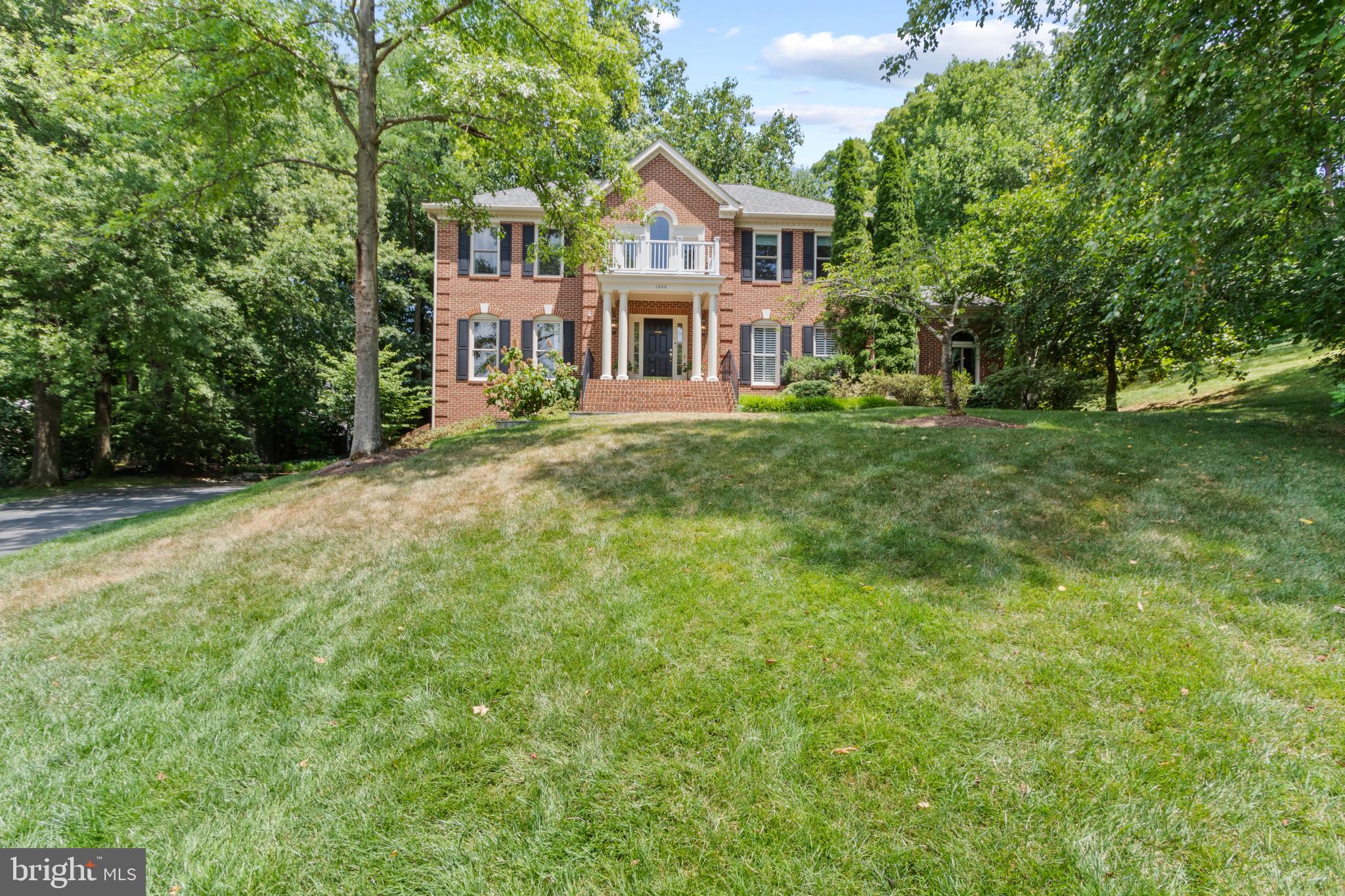 From the moment you approach this lovely colonial situated on a beautiful private cul-de-sac, you will discover why this home has been treasured by this family for the last decade.  
    This grand and gracious 4 bedroom, 4 bath (3 full and 1 half) residence features a 3-car side-loading garage and 3 finished levels of well-designed, architecturally detailed living space that flows effortlessly through a variety of rooms and areas that meet every need for today’s buyers.  A grand two-story foyer has been tastefully appointed and all the existing fixtures throughout, many one-of-a-kind, convey with the home.  
The foyer is flanked by an at home office, that is well designed and bright and affords easy access to the more commonly shared spaces but it also offers privacy and lovely views of the private cul-de-sac.  The hardwood floors were refinished in 2014 to reflect their rich oak composition and the wall-to-wall carpet was just replaced.  
     The other side of the foyer presents a lovely formal living room which leads to a large dining room; this side of the home also offers an inviting sunroom which is a separately zoned area (the heat pump was replaced in 2020).    Music and art have been an important part of this home and  is obvious in this sunroom; its well-designed Palladian-like windows complement the interior love of the arts with the natural beauty of the landscape design clearly visible through these windows.
    The gourmet kitchen and design are a chef’s dream.  New quartz countertops and tiles, re-painted cabinets, a Viking stove with center island and attractive seating, and a brand new  double wall oven are just a few of its features.  There is additional room for a kitchen table if desired; a pantry and an adjoining spacious and bright family room with wood burning fireplace make this is a natural gathering area for family and friends.  An attractive half bath is also located just behind the entry foyer.
    The back and side yards of this home offer unique entertaining opportunities and afford wonderful everyday relaxation and outside enjoyment:  In 2017, the porch, deck and patio were newly constructed.  The screened porch boasts of skylights and a dramatic design.  A wood burning fireplace with copper surround, attractive flagstone hardscape, trek decking, a Big Green Egg stove, built in gas grill with roughed-in gas supply,  and a screened porch with glass inserts are just some of these exterior improvements that unite both the interior and the exterior livability of this residence.    The play structures (2015) at the top of the hill convey with the home.  Recent exterior and interior lighting improvements make each area attractive at different times of the day.  To further protect the external beauty, an irrigation system was installed in 2014.  New garage doors (2014), new roof (2021) and new furnace/AC (2022) were additional improvements made by the current owners.  
     The lower level of the home with access to the outside by way of the mud room and garage doors creates additional entertaining or guest areas:  a  recreation room, a wet bar with refrigerator and microwave,  a full bath and great storage areas complete this attractive and multi-use level.  The wall mounted TV in the lower level family room conveys with the home
     The third level boasts of 4 bedrooms, a full hall bath, an owner’s en-suite and walk-in closets in all of the bedrooms.  All of the windows on this level have also been replaced with Renewal by Anderson products.    The owner’s suite also features motorized  window shades  Each room has great exposure and design and will meet your most discriminating client’s needs.  
      Located in Fenwick Estates, this popular community is convenient to shopping, the George Washington Memorial Parkway, Sherwood Regional Library, Mount Vernon INOVA Hospital, the Historic Mount Vernon, the George Washington Presidential Library, Fort Belvoir and Old Town, Alexandria.