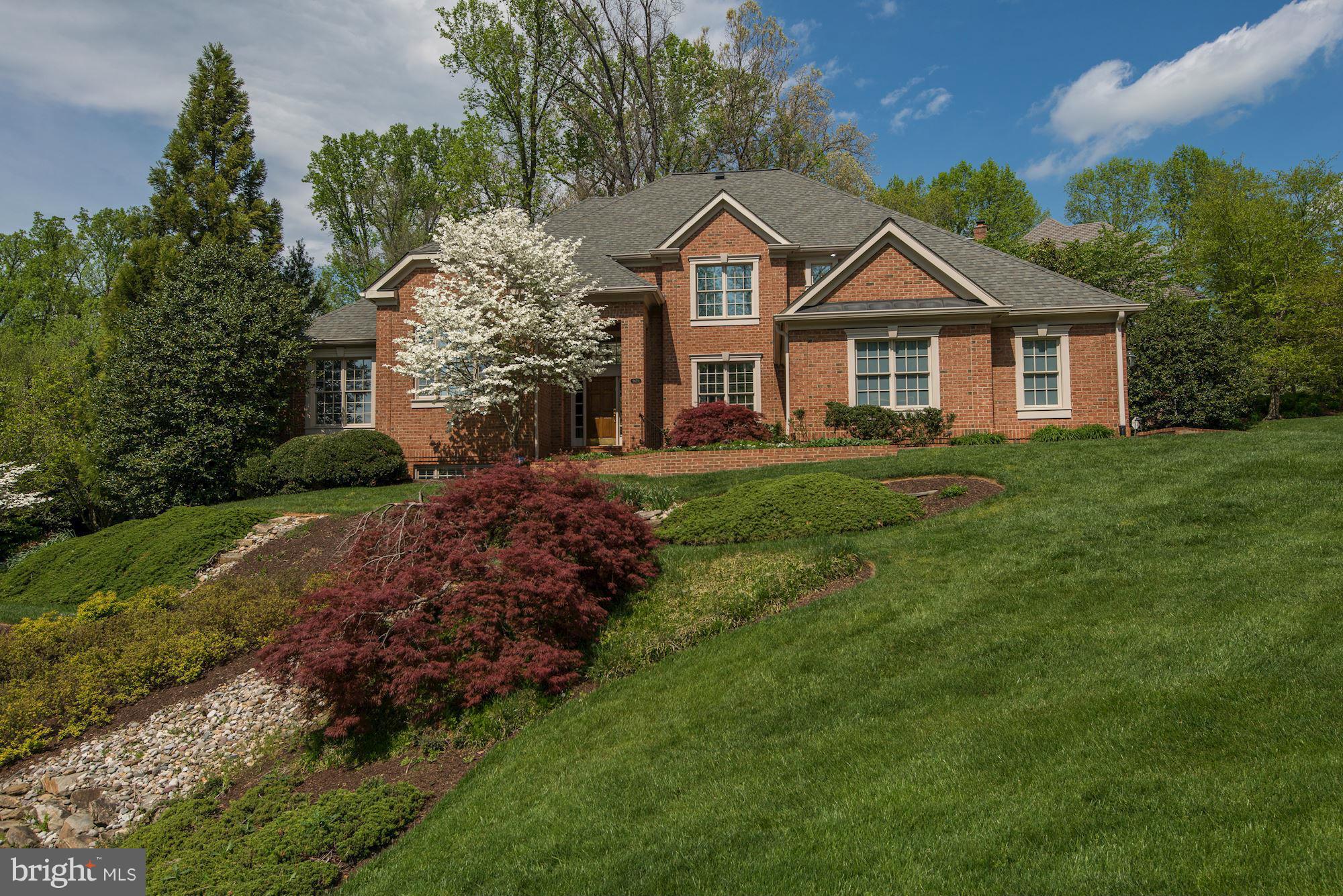 Exquisite 2-story center hall col * 6200 + sf of living * Main level master suite * High end chef's kitchen with custom cabinets, leathered granite countertops, copper farm sink & tumbled marble backsplash * Light-filled expanded lower level   2 BRs / 2 BAs, kitchenette, game & media rms, huge screen & surround sound * Mature landscaping for privacy & play * Pool surrounded by handsome hardscaping