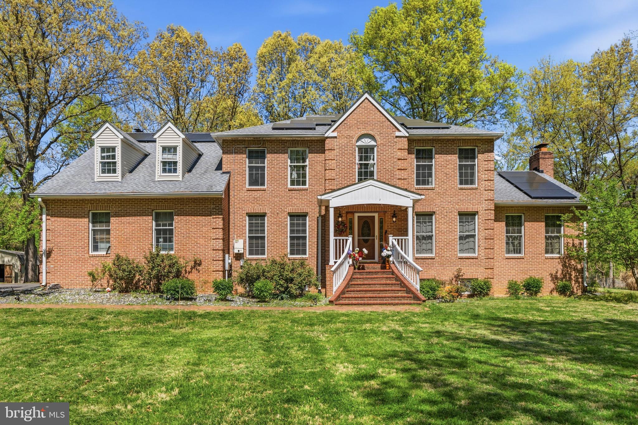 Experience the ultimate private sanctuary at 1801 Springvale Ct where luxury, acreage, and limitless flexibility converge on over five sprawling acres in the heart of Accokeek. This exceptional estate offers a rare opportunity to own a multi-generational retreat or a private family compound designed for both grand-scale entertaining and quiet rejuvenation. From the moment you arrive, the peaceful, wooded setting provides a true escape from the DMV’s fast pace, backing directly to nature for a level of serenity that is increasingly hard to find.

The home’s expansive floor plan features six spacious bedrooms and nearly 5,600 total square feet of thoughtfully designed living space. The heart of the home is a gourmet kitchen equipped with a massive island and  double ovens, flowing seamlessly into gathering areas warmed by one of three elegant fireplaces. Rich hardwood floors, vaulted ceilings, and a sun-drenched floor plan create an atmosphere of refined comfort. Beyond the main residence, a separate office/studio structure serves as the perfect headquarters for entrepreneurs, a creative getaway, or a private suite for long-term guests.

Outdoor living is equally impressive, with a massive deck overlooking your private forest, offering a front-row seat to the scenic beauty near Piscataway National Park. Despite its secluded feel, this property provides convenient access to Alexandria, National Harbor, and Washington D.C. This rare combination of house, studio, and land represents an incredible value. Schedule your private tour today to experience this one-of-a-kind lifestyle property.