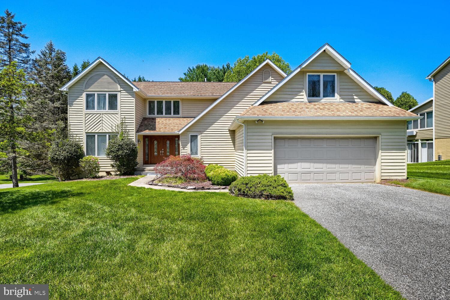 Welcome to this exceptional home located in the highly sought-after Velvet Hills neighborhood, perfectly positioned on a quiet, non-through street. Impeccably maintained and thoughtfully designed, this residence offers a perfect blend of elegance, comfort, and functionality. The main level welcomes you with an inviting entrance and spacious foyer. The stunning kitchen features abundant cabinetry and large drawers, a wall pantry with convenient pull-out shelves, a center island, granite countertops, and stainless steel appliances. The bright breakfast area includes a sliding door that opens to the deck, perfect for enjoying outdoor dining.

The expansive living and dining room combination showcases elegant hardwood floors and recessed lighting, providing an ideal space for entertaining. A cozy family room with a charming wood-burning fireplace offers a warm and relaxing atmosphere.

Upstairs, the spacious primary suite includes a private en-suite bathroom and a walk-in closet. Three additional generously sized bedrooms complete the upper level, which features hardwood flooring throughout.

The fully finished walk-out basement adds exceptional living space with a large game room, a fifth spacious bedroom, and a full bathroom—perfect for guests or extended family.
Brand new gas furnace.

Outside, enjoy a private, level backyard ideal for relaxation, play, or entertaining. Conveniently located close to shopping, restaurants, and many public amenities, this home offers both comfort and convenience in a sought-after location.