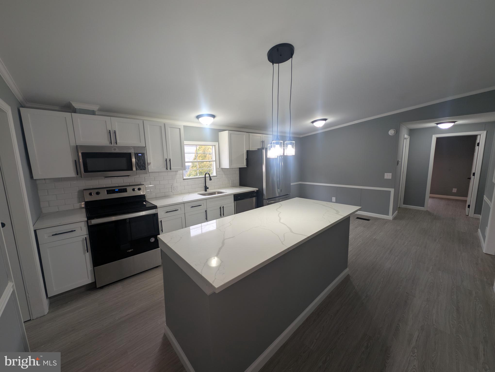 Beautifully remodeled 3 bed/2 bath in Bush River Manor. Home sits in a private wooded setting. Ideal for sitting outside with your drink of choice.  Lot rent is $961