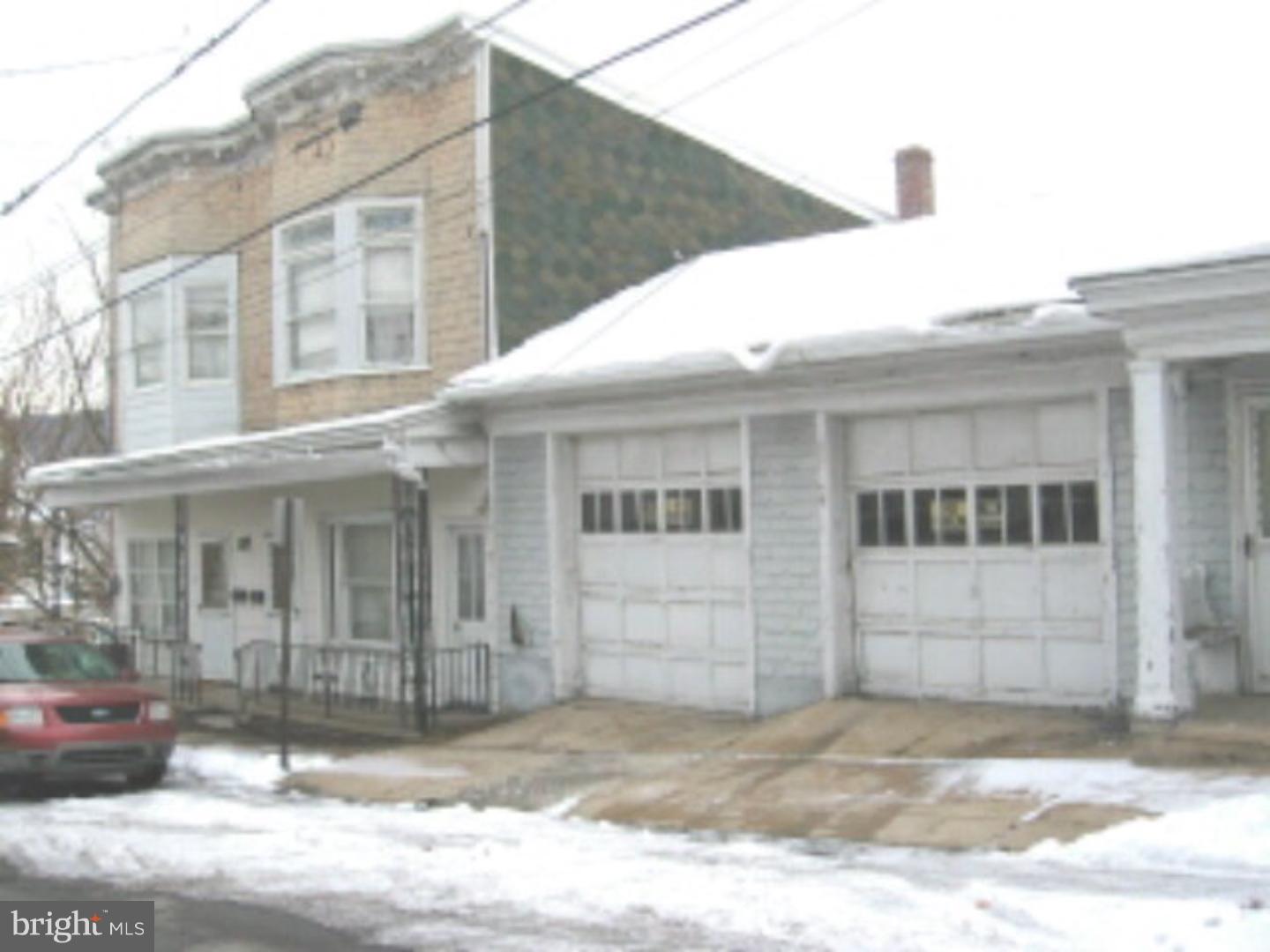 Single property/5 vehicle oversized garage(heated),electric garage doors,with Lower Level Living Quarters. Also included with sale are two - 3 story additional homes.(2904 sq ft).Sold in an AS IS condition.Boro Inspecton done, any necessary repairs are Buyers expense.Cash purchase only.Call agent for more info. Mailing Address Continued: Shenandoah Amp: 100