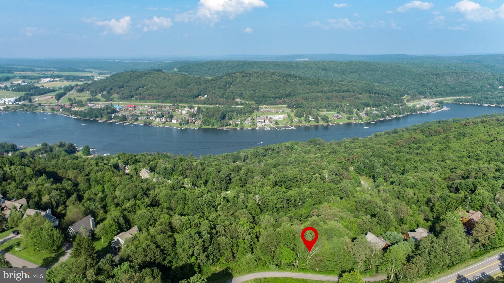 Build your mountain retreat in the sought-after Highline community at Deep Creek Lake! This beautiful homesite offers panoramic mountain and lake views, offering the perfect blend of beauty, privacy, and convenience. Public water and sewer hookups available. Ideally located just minutes from Deep Creek Lake, restaurants, shopping, and year-round recreation right out your doorstep. Highline is known for its scenic mountain setting and proximity to Wisp Resort, making it a great location for any outdoor enthusiast. Don't miss this opportunity to create your custom mountain getaway in one of Deep Creek's premier communities. Call today for details!