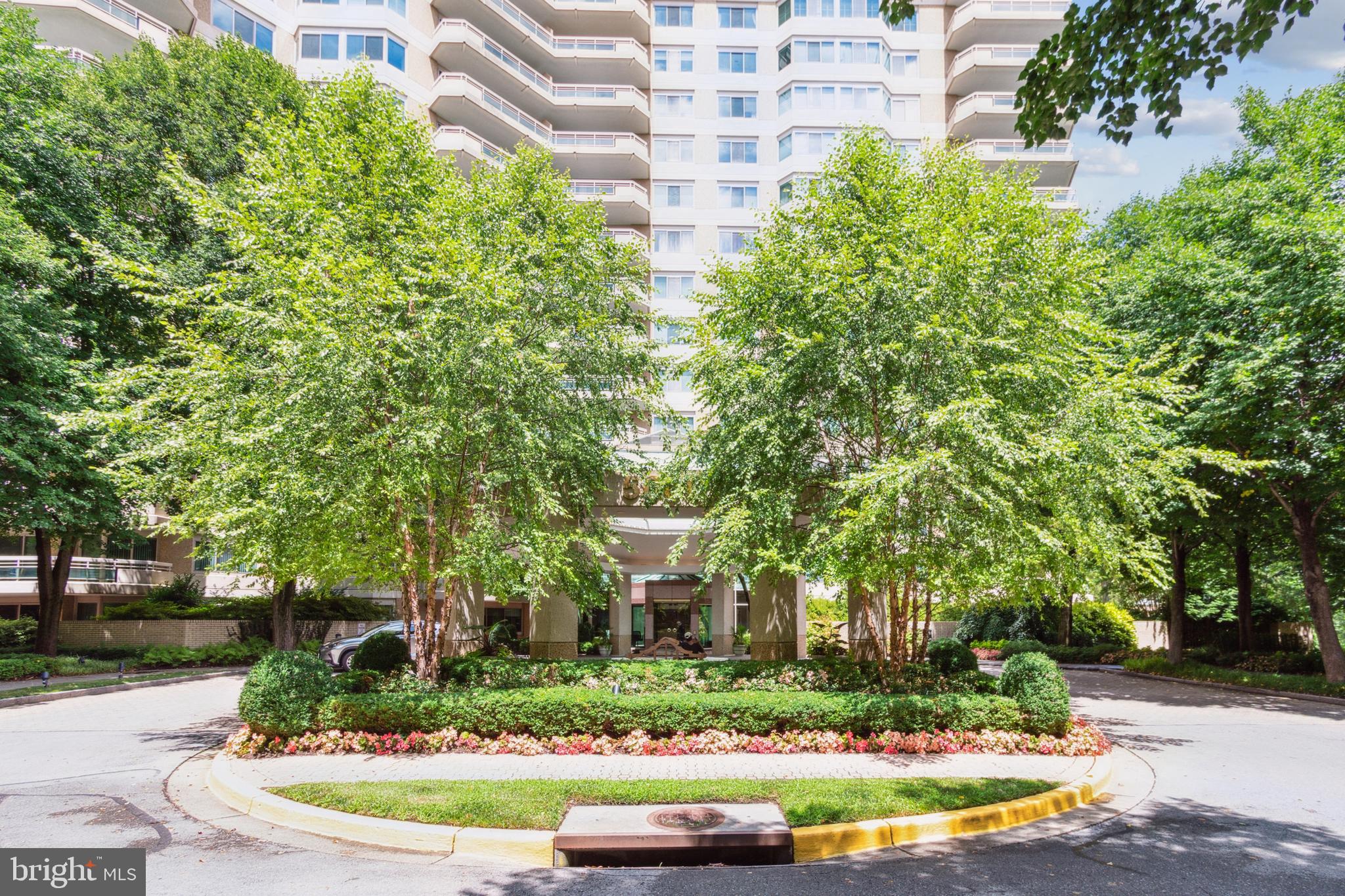 This elegant and contemporary 2 BR, 2.5 BA plus balcony with tree-level vistas was extensively renovated in 2002. Renowned designer Gerard L Smith Associates opened up the kitchen & took down interior walls, reimagining the space to allow  for creative flow and leafy views, with a recurring circular design in the foyer and kitchen dropped ceilings and the kitchen counter. Extensive birds-eye maple cabinetry and built shelving provide truly amazing storage. The spacious primary bedroom with ensuite bath boasts multiple built-ins AND a huge walk-in closet. The secondary bedroom  features wrap-around windows, its own ensuite bath and closet plus a vanity and built-ins.  Life at the incomparable SOMERSET HOUSE offers a refined lifestyle, with manicured gardens, walking paths and every imaginable amenity (pools, fitness center, tennis/pickleball, a party room with kitchen, activities, doormen/valet, 24-hour concierge and so much more). Ideally located in a gated complex just north of Friendship Heights, it's an easy stroll to Metro, luxury shopping, fine dining and more. A storage bin and one garage parking space convey. (Building may have more parking spaces available for rent.) No public open houses.