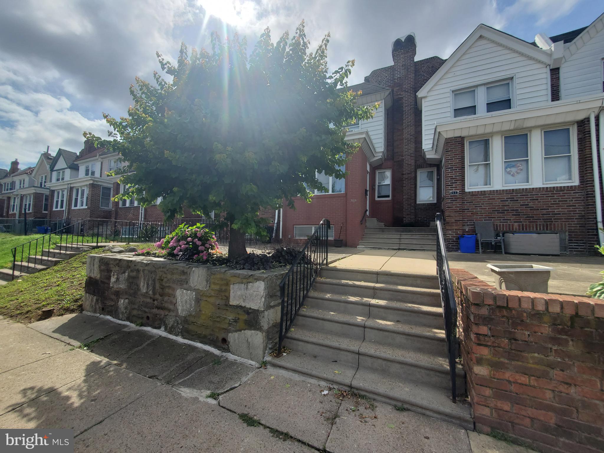 Welcome to 7119 Cottage St.  This lovingly maintained 3 bedroom, 1 &1/2 bath straight thru Tacony home with central air and driveway parking is seeking a new owner.  An apricot tree which bears fruit bi-annually graces the spacious front patio along with a small patch of landscaping.  Upon entering the front door you'll find an open airy space with a good amount of light for an interior row home, along with a kitchen that has been updated during seller's ownership.   A finished basement with a half bath and rear walkout is great for additional living space.  Don't miss out, schedule your appointment today.