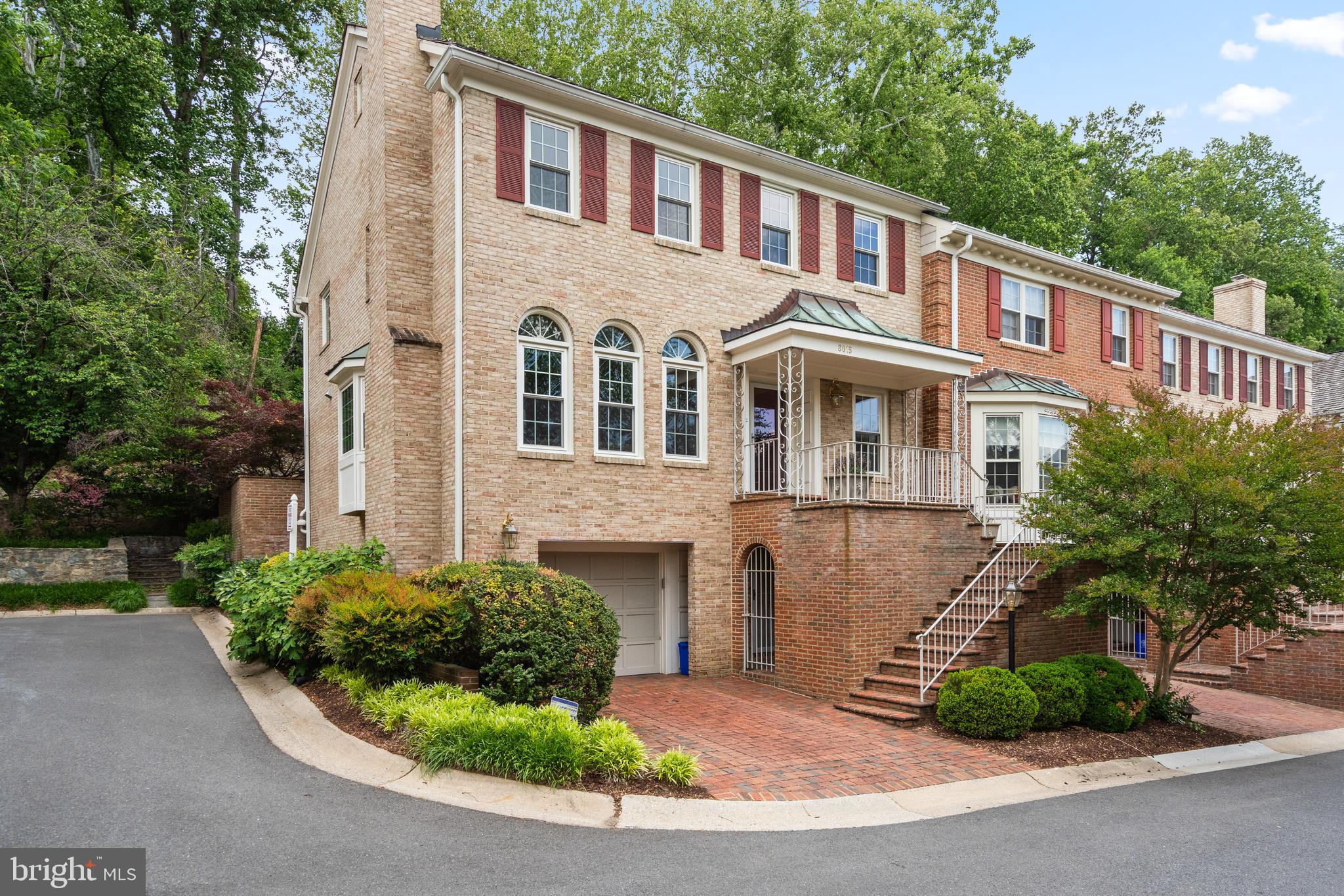 Perfectly positioned on a private corner lot, this sun-filled Mitchell & Best end-unit townhome has been meticulously maintained and thoughtfully updated throughout. Featuring high ceilings and gleaming hardwood floors, the home offers an elegant yet comfortable layout with expansive formal living and dining rooms, a gourmet kitchen with center island, and an inviting family room highlighted by a beamed ceiling and wood-burning fireplace. Gorgeous replacement windows and French doors open to a private terrace, creating seamless indoor-outdoor living.

The spacious owner’s suite features a vaulted ceiling, two walk-in closets, and a luxurious en-suite bath. Two additional generously sized bedrooms, a remodeled full bath, and an upper-level laundry room complete the bedroom level. The fully finished lower level includes a private recreation room, full bath, and a versatile den/exercise room with its own exterior entrance.

Recent updates provide exceptional value and peace of mind, including a NEW ROOF (2022), AC and evaporator system (2022), electric car charger (2022), duct cleaning (2022), backyard masonry improvements (2023), dishwasher (2023), storm doors (2023), new oven (2025), upgraded garage door lift mechanism with cameras and related systems (2025), and a new backyard gate (2025).

Beyond the home itself, the location is exceptional. This neighborhood is highly acclaimed for Winston Churchill High School pyramid. Seven Locks Elementary is ranked #8 in Maryland, Cabin John Middle School ranks #12 and Windson Churhill High School ranks #8 according to U.S. News.

The oversized two-car garage offers tandem parking and abundant storage space. Combining timeless design, quality updates, and a premium lot, this exceptional home delivers both comfort and convenience in a highly desirable setting.