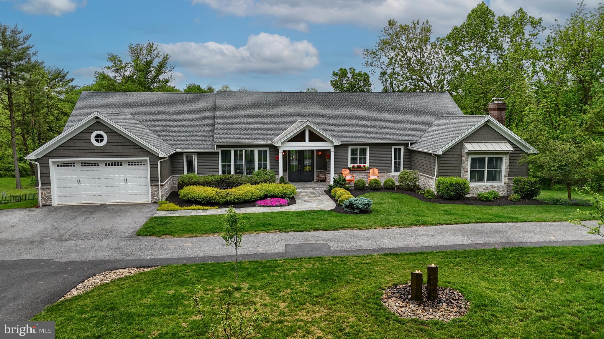 Don’t miss out on the opportunity to own a truly amazing and unique property in Dauphin County. Welcome to 600 Pine Road! Off the beaten path, offering privacy and tranquility, this home, built in 1996 was stripped down to the studs and completely remodeled in 2017 by the current owner. The entire home was transformed into a luxury modern farmhouse, with an open floor plan. The owner was pursuing her interior design degree during the time she lived there, and her education and training is evident in design and the high end, one-of-a-kind selections throughout. You will be amazed when you walk through the double ThermaTru glass front door into a wide-open foyer with custom built ins by Colonial Kraft and a peak ceiling, which then leads into a massive, open kitchen-dining-living room combination. The gourmet chef’s kitchen is so big, it boasts TWO huge islands, one with a prep sink and built-in drawer microwave oven, the other with an abundance of storage and live-edge natural wood top. A five-burner gas cook-top with custom fabricated metal range hood enhances the sight line from the living room. Finishing off the kitchen double wall ovens, a Viking beverage refrigerator and a counter depth stainless steel refrigerator, plus a walk in pantry with double refrigerator drawers and custom cabinetry. A Nana Wall fully collapsible accordion window above the main kitchen sink allows you to serve snacks to guests who are sitting outside on the deck at the window counter as they take a break from swimming in the pool. The living room, accented with shiplap walls, includes one of the 3 fireplaces – double-sided to enjoy inside on cold winter days, as well outside on chilly spring or fall evenings on the deck! On either side of the gas fireplace are tall Nana Wall accordion doors that open to the deck leading to the backyard/pool area. The deck is huge, has composite decking and stainless steel cable railings.  Continuing from the living room you’ll find the primary “resort” which includes its own private screened-in porch with vaulted ceiling, full bath with soaking tub, oversized tiled shower with heated floors and custom double vanities. This side of the house also includes a dream laundry room with more custom cabinetry and an office with a wood-burning fireplace. This could also be used as the 5th bedroom.  On the other side of the kitchen, you have two bedrooms with a Jack & Jill bathroom between them, a powder room, another drop zone with more custom cabinetry and mail/charging stations, and the garage access. Also added in the remodel is a private suite upstairs which includes a bedroom and full bath.  On to the star of the home, the backyard oasis. This extensive outdoor living space is more than anyone can dream of. The current owner invested over $500,000 in this area and it shows! An enormous concrete salt-water pool with spa, custom lighting, gas fire features, and other special touches (hello walkway inside the pool!). There is a separate large gazebo with a standing seam metal roof, and under this a large stone fireplace with a hook up for a TV above that, wood storage built in on either side, and separate ambient lighting and outlets.  A built-in barbeque that is hooked up to the property’s propane tank as well as an outdoor refrigerator and concrete countertop rounds out this space. The entertainer’s dream back yard! Also, this 7-acre lot has a pond that the current owners fish from, and easy access to the Swatara Creek, which borders the property. All of this in East Hanover Township in the Lower Dauphin School District.