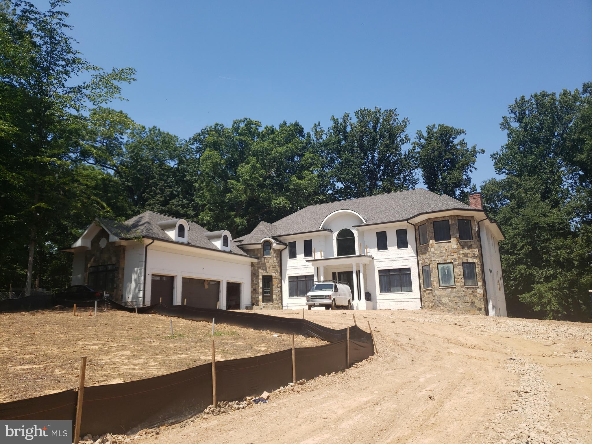 Another stunning project from AR Design Group interior design by Hallstrom & Associates. Gorgeous Private 1 Acre lot in the  heart of McLean features a 4-Car garage and 8300 square feet on the main/upper level  with over 12000 square feet of finished exquisite craftsmanship. 4 upstairs BR all w/ Walk-in closet & full BA. HUGE Master Suite w/ Spa Bathroom. Fully finished lower level Still time to customize features/opt