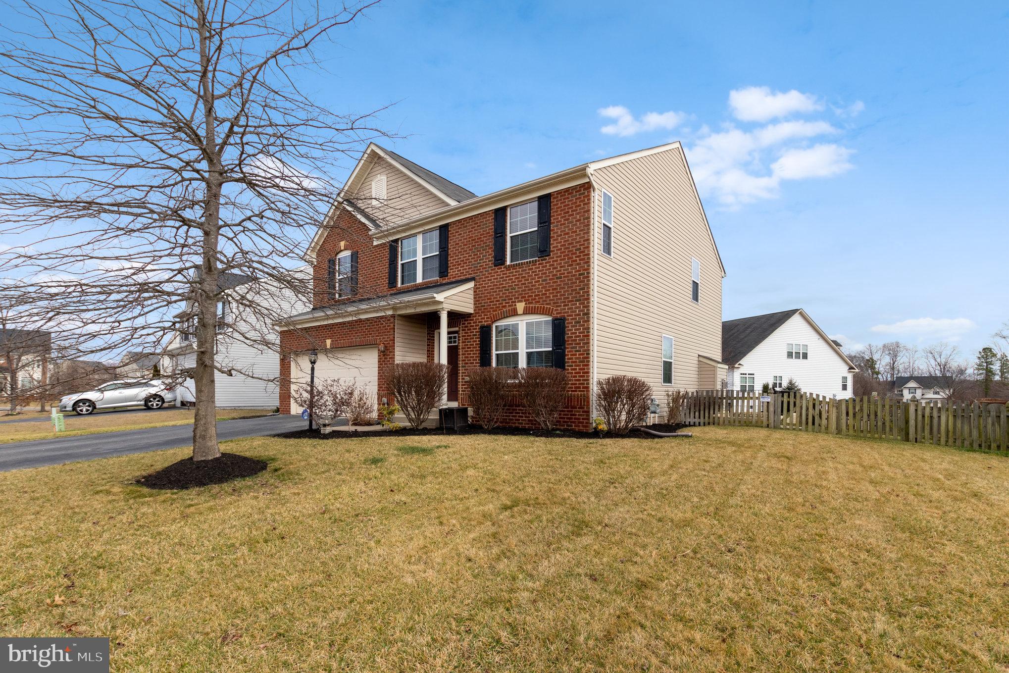 Welcome home to 5 Wildwood Place! Built in 2011, this brick front colonial is ready for you & your family and offers up to $10,000 in Seller Subsidy for closing cost assistance right off the bat! The sellers had one of the areas MOST THOROUGH home inspectors perform a pre-marketing inspection and went above and beyond in response to make sure the home was move-in ready! (home inspection available upon request) The interior is freshly painted throughout meaning your home will be ready to show off the day you unpack!  Kitchen features include a gas stove, granite countertops, and a GE: Keurig refrigerator to make your morning cup of coffee easier than ever!  The other appliances are Stainless Steel as well, ensuring a clean fit and finish. Head upstairs and check out the rooms.  For those who love clothes, look no further! The primary bedroom has 2 walk in closets!  The bathroom features a jet tub, stall shower, and separate water closet.  Each bedroom includes a flat screen television, wall mount, and remote control!  Step out back and take in the back deck perfect for an outdoor table & chairs or a grilling area.  The breathtaking stone hardscape has been meticulously maintained and is ready to keep you warm on cold nights with the stunning firepit.  Don't wait to schedule your showing because this move-in ready listing located in Stafford Lakes Village won't last long!
